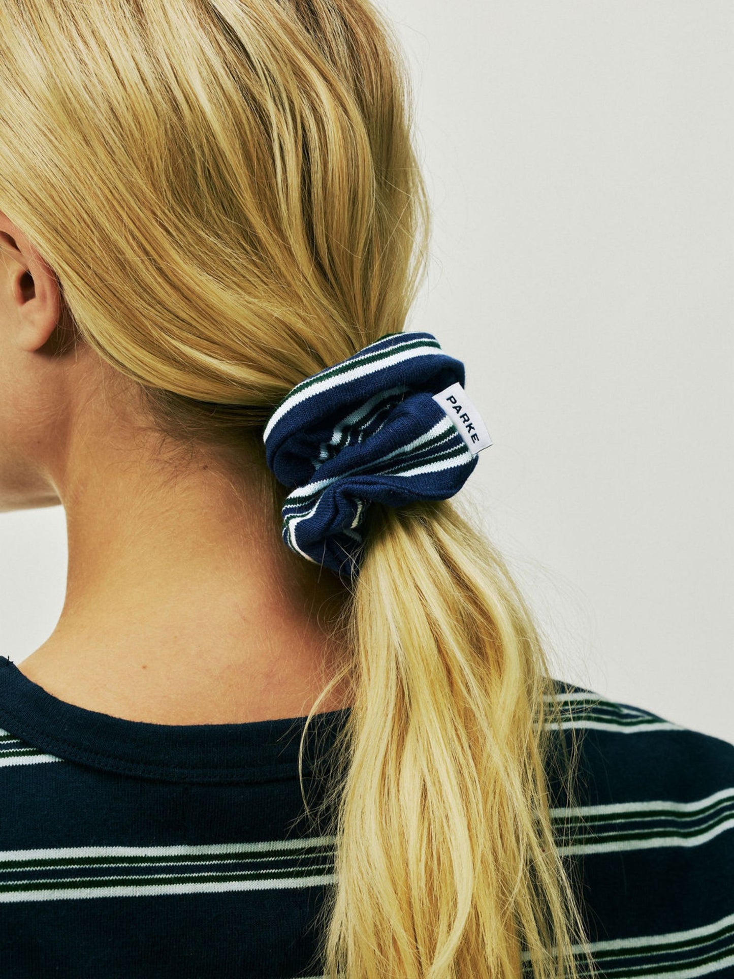 girl wearing Holiday Hair Set -snowflake stripe