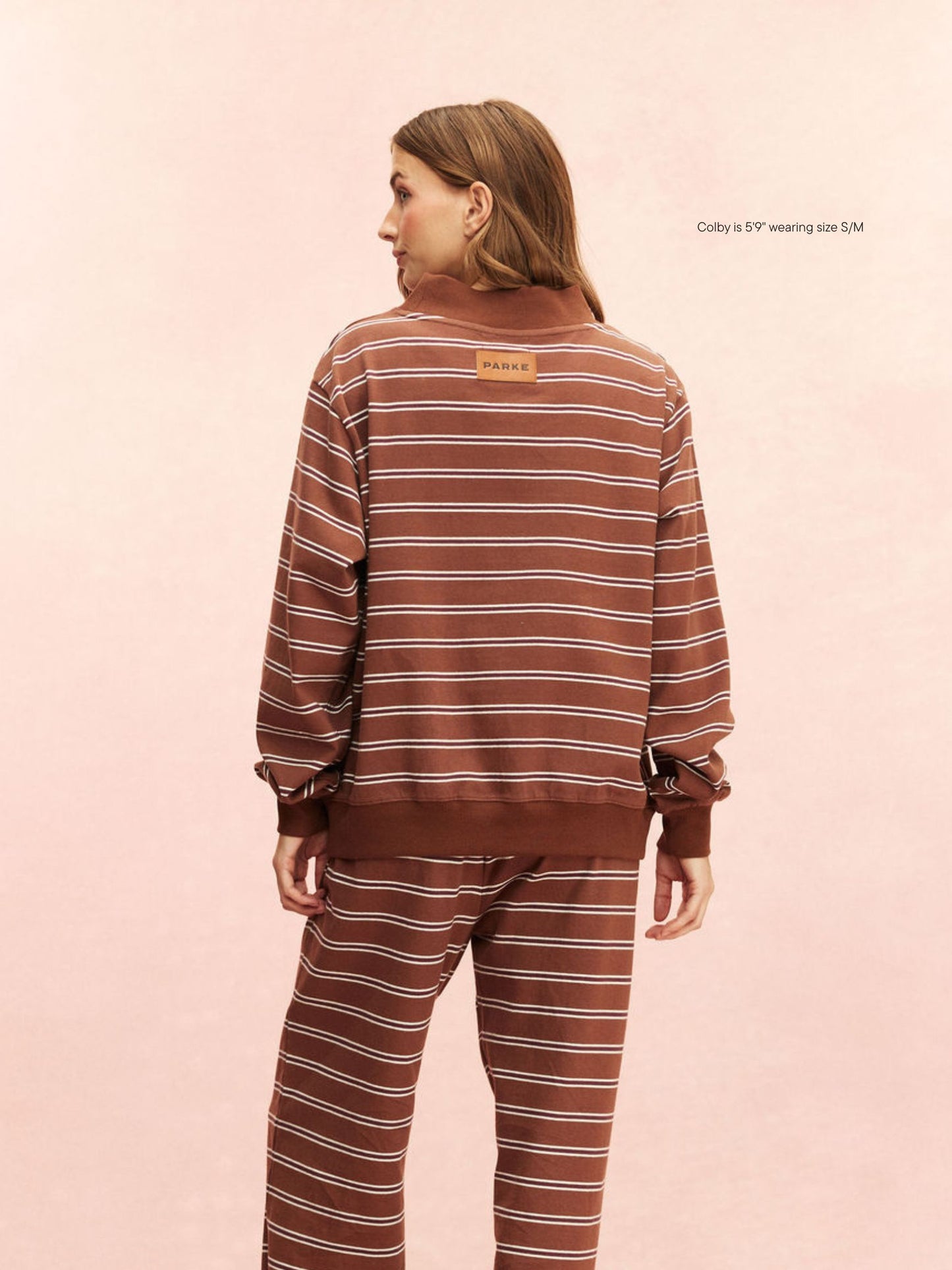 girl wearing Striped Mockneck Pullover -tonal stripe