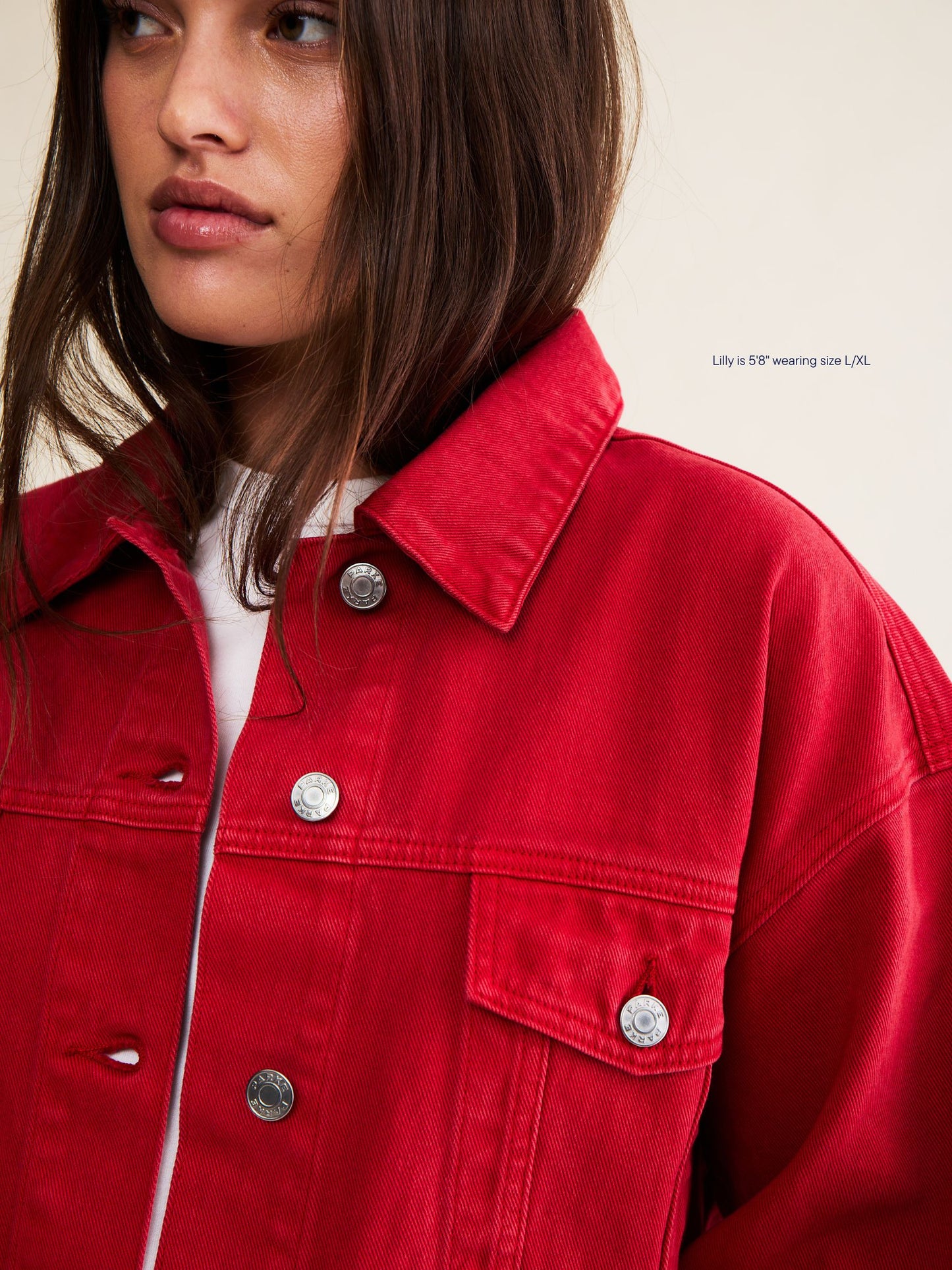 vintage wash girl wearing oversized denim jacket -washed red