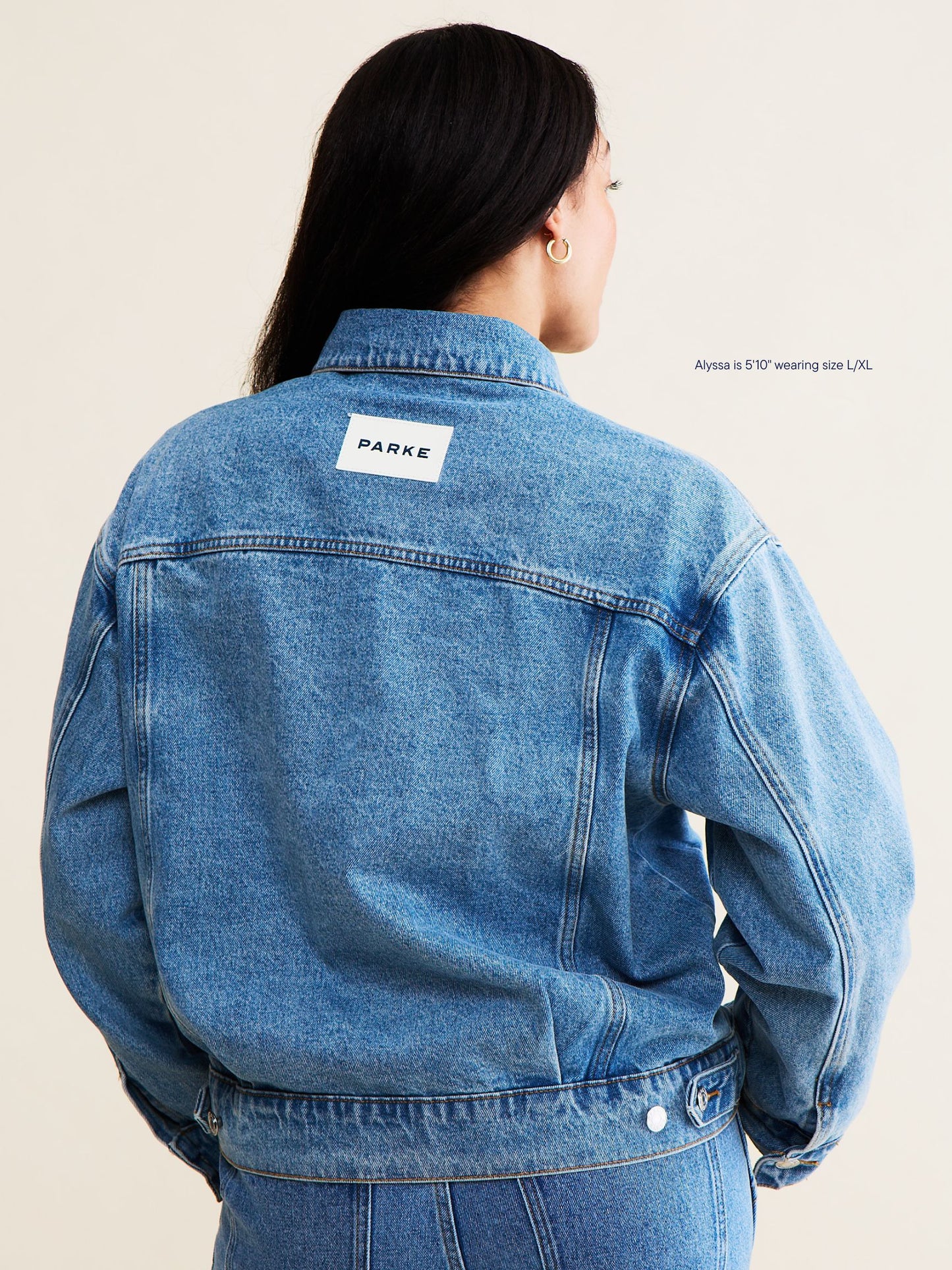 vintage wash girl wearing oversized denim jacket -vintage wash