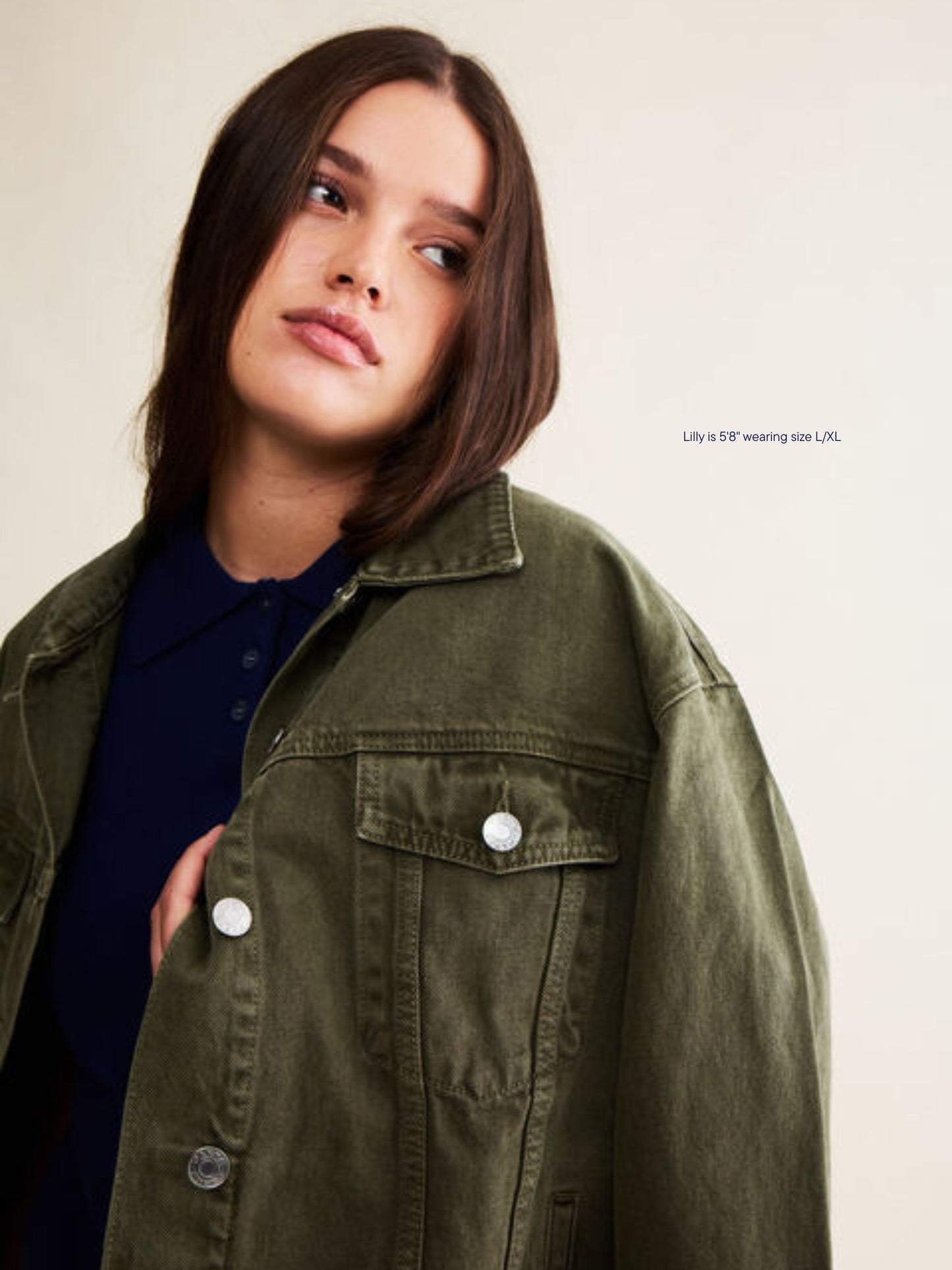 girl wearing olive oversized denim jacket -olive