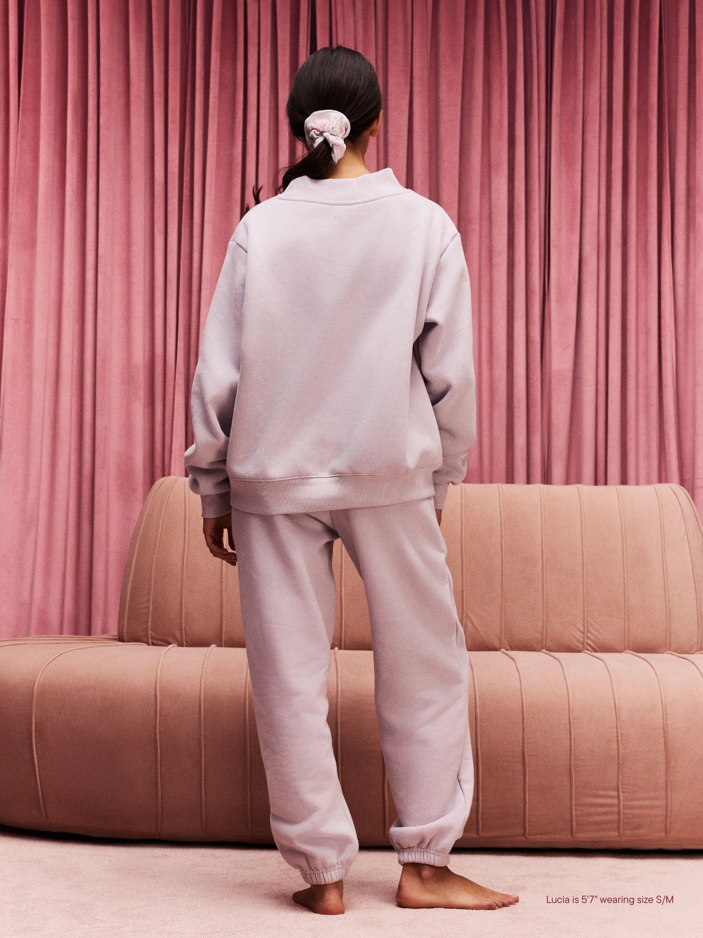 girl wearing Drawstring Unisex Sweatpants -lavender