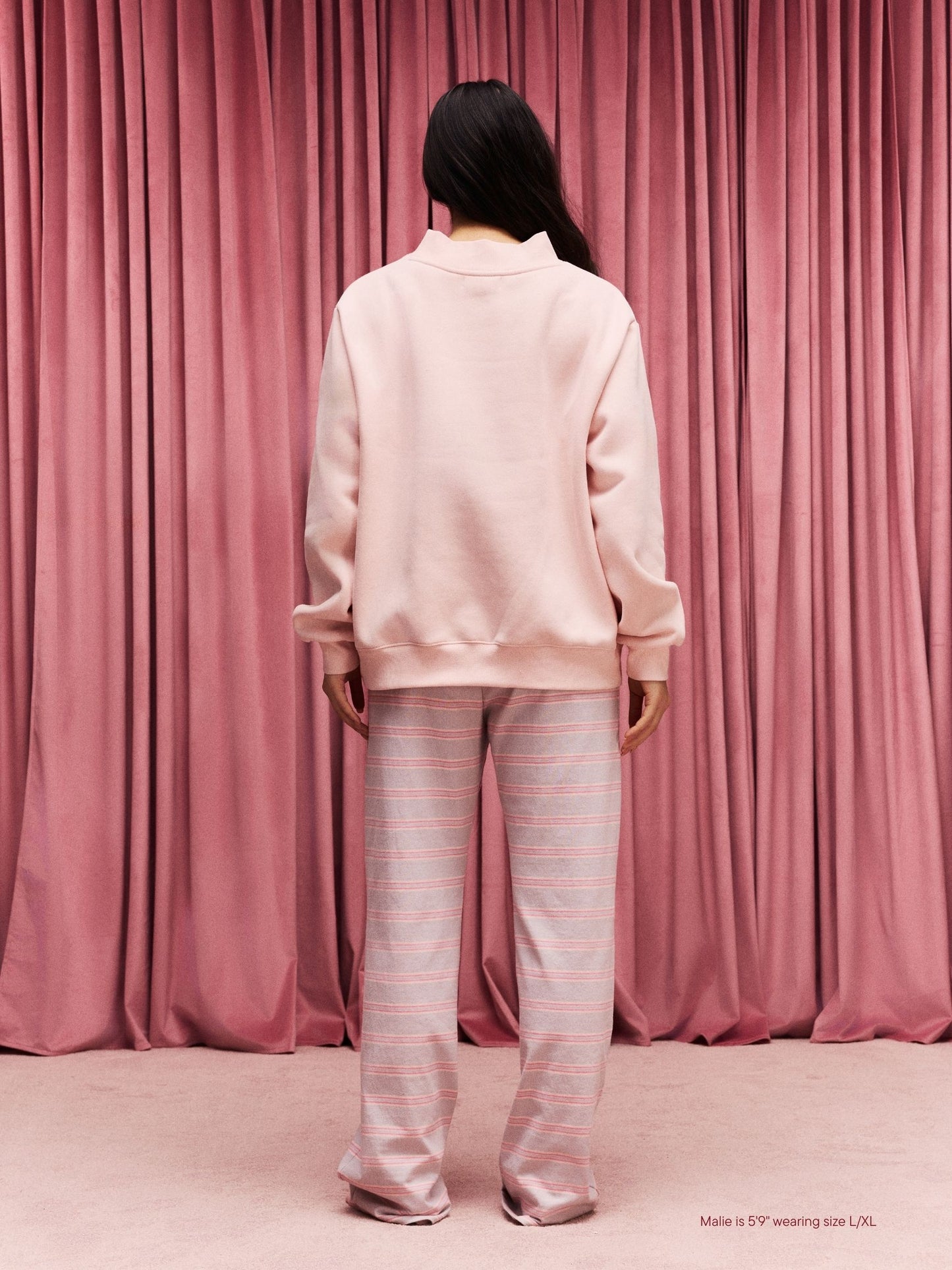 girl wearing Heart Varsity Mockneck -peony + denim