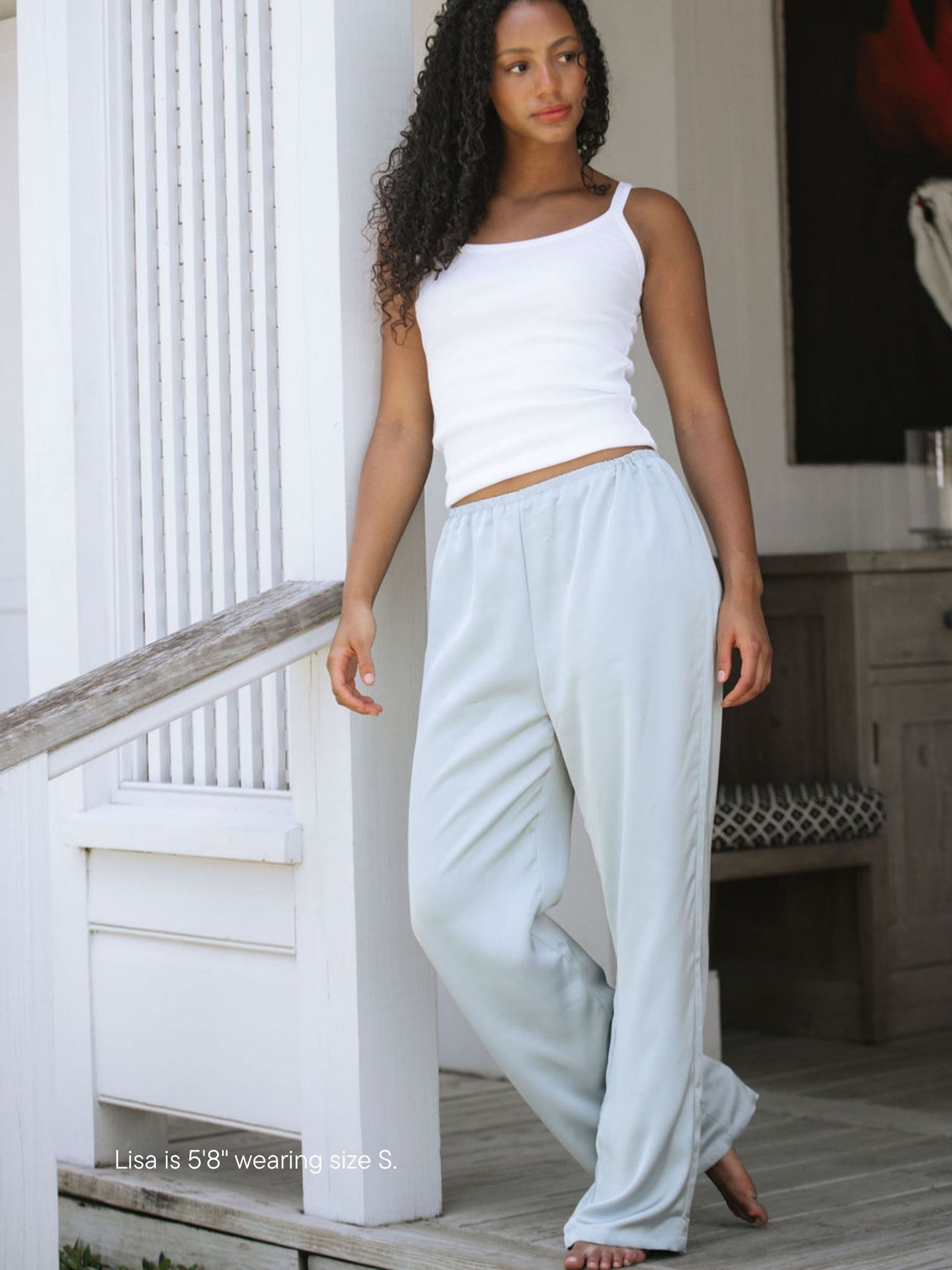 girl wearing satin pants -something blue