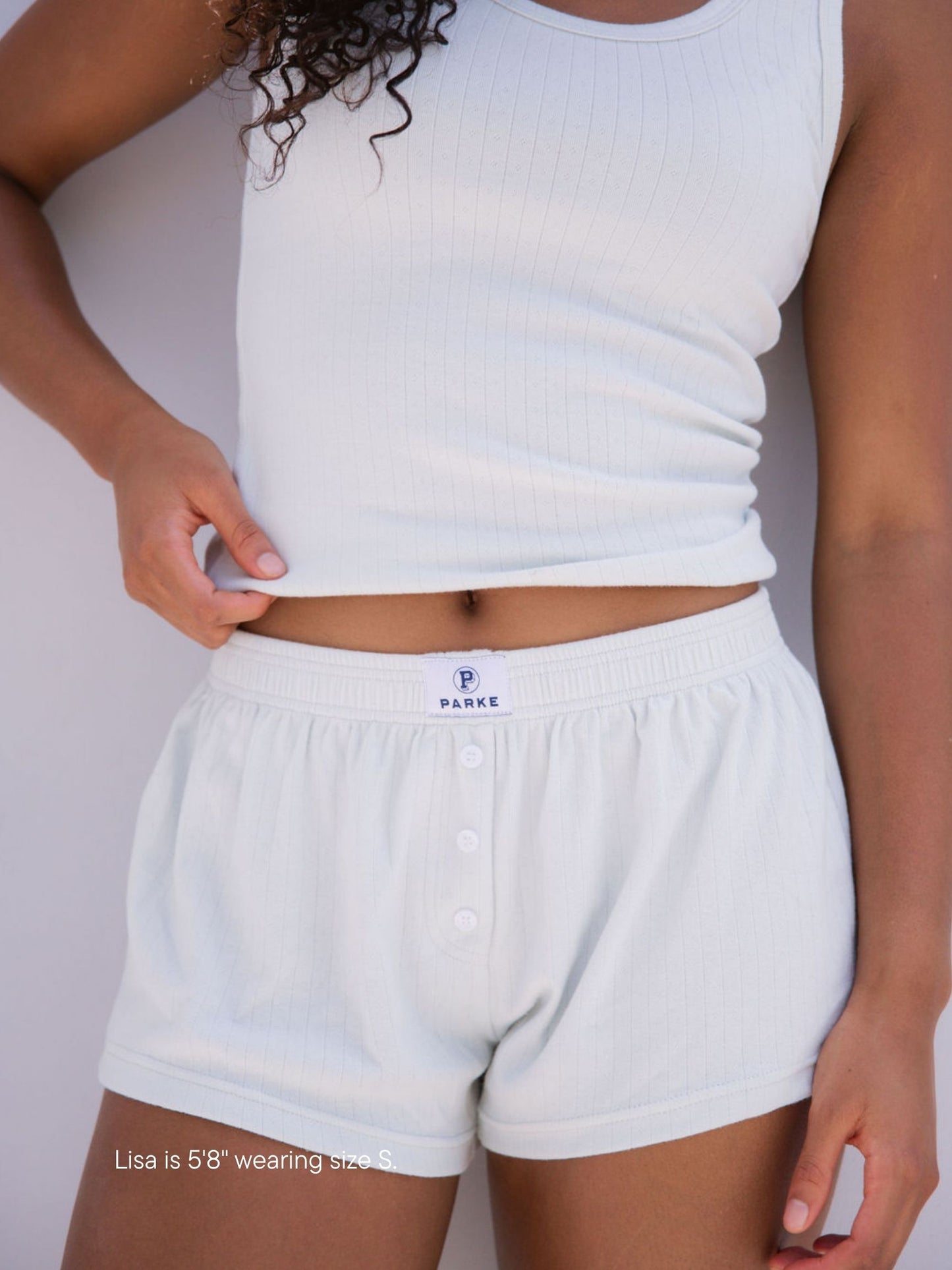 girl wearing pointelle shorts -something blue