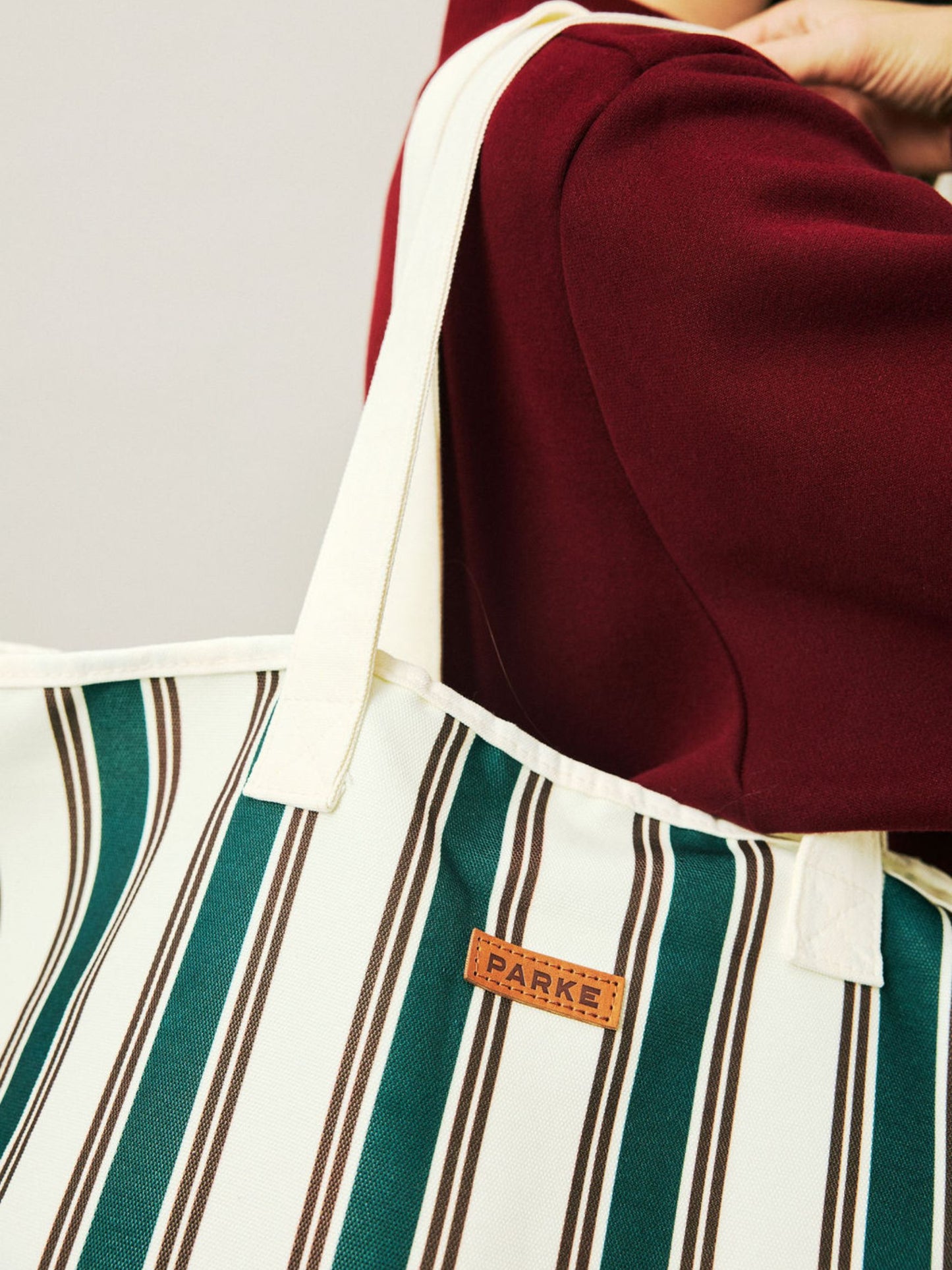 girl wearing Holiday Striped Oversized Tote -eggnog stripe