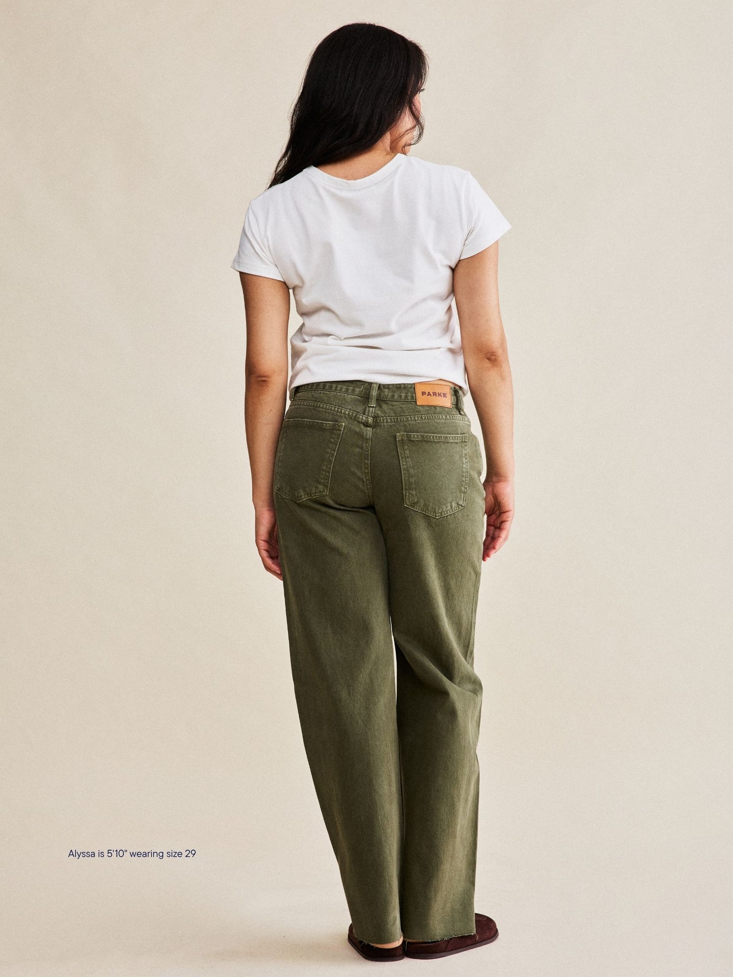 girl wearing low rise baggy jeans -olive