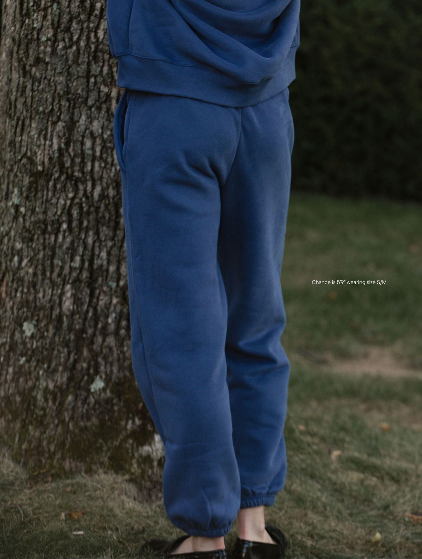 girl wearing Drawstring Unisex Sweats - crown blue