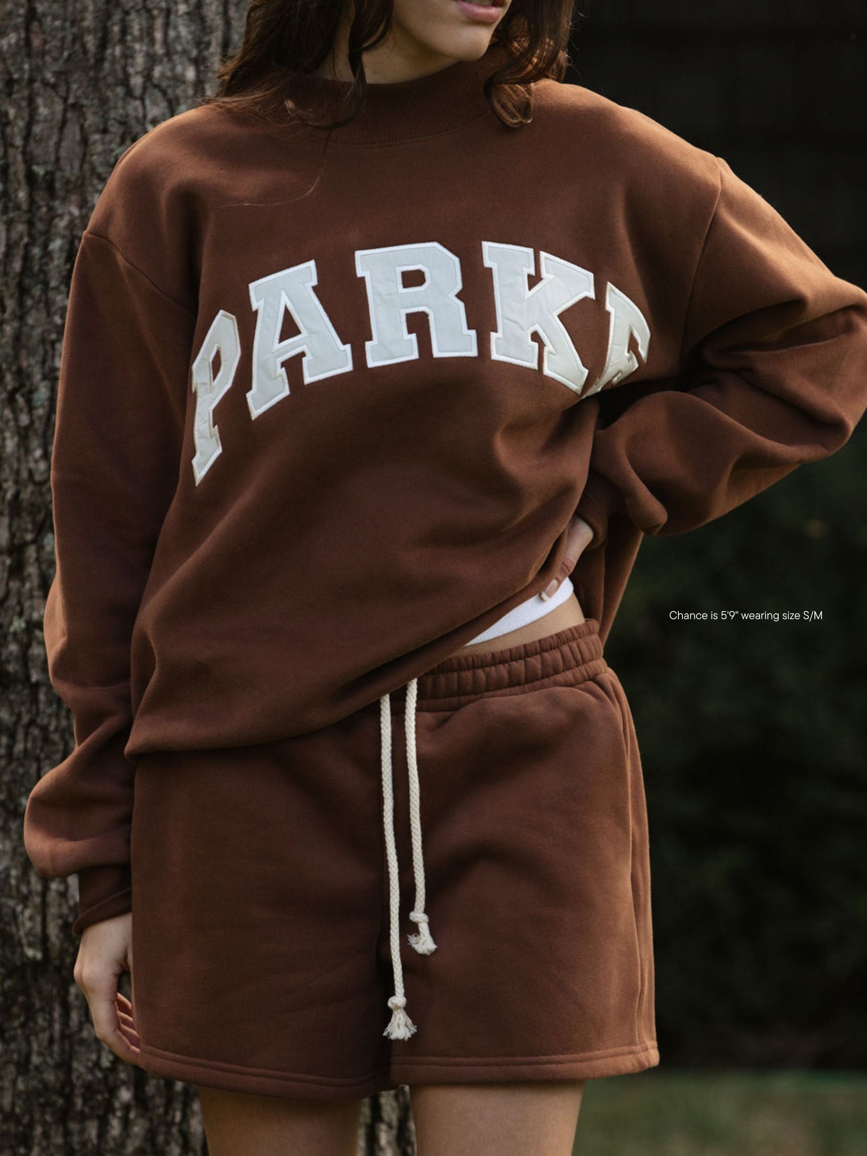 girl wearing hometown varsity mockneck -mocha + cloud