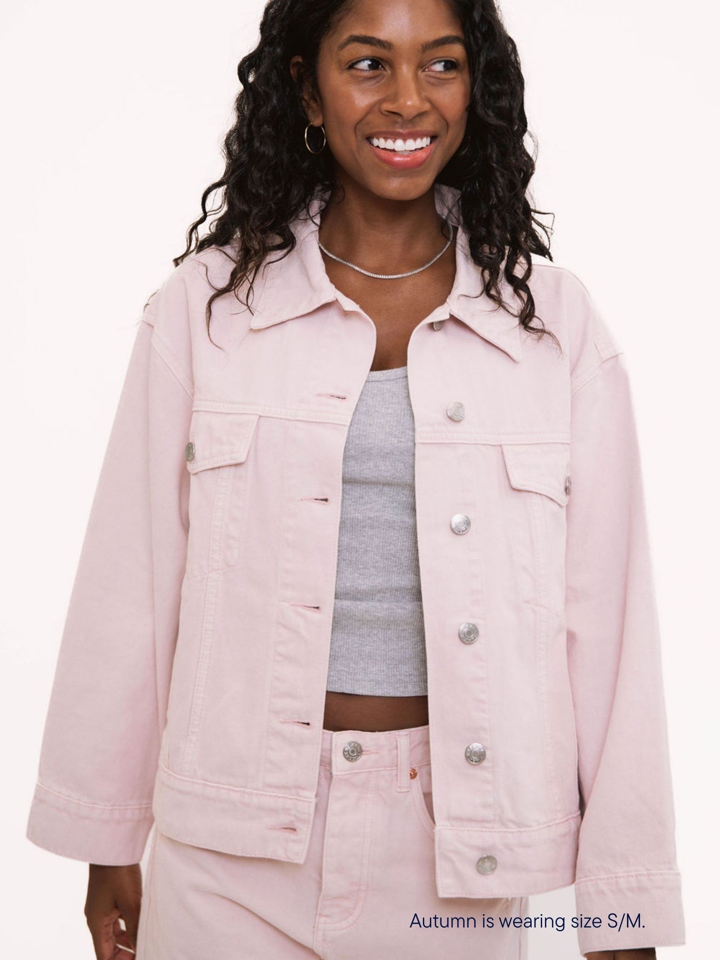 girl wearing parke x scl oversized jean jacket -petal
