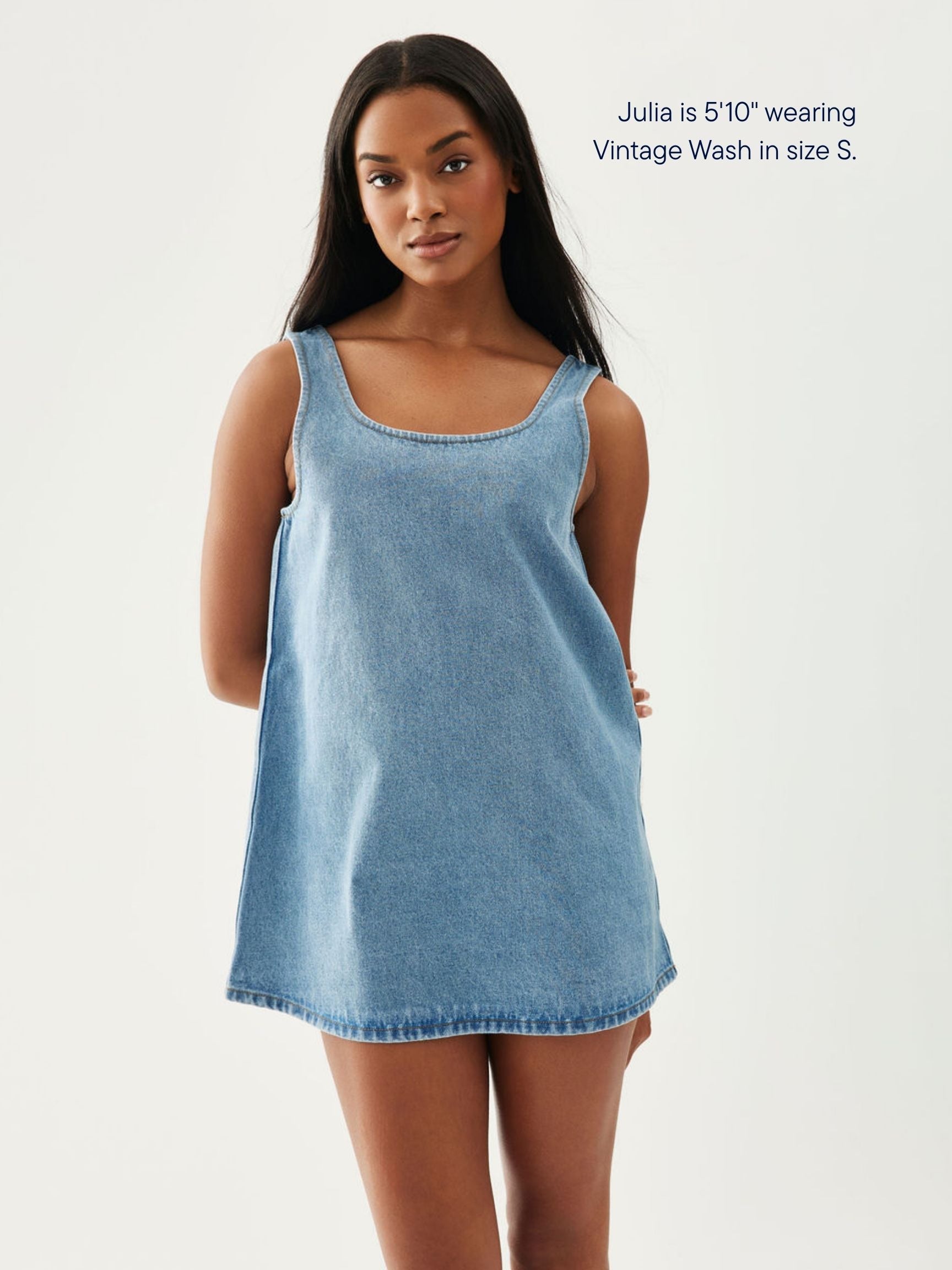 girl wearing denim mini dress -vintage wash