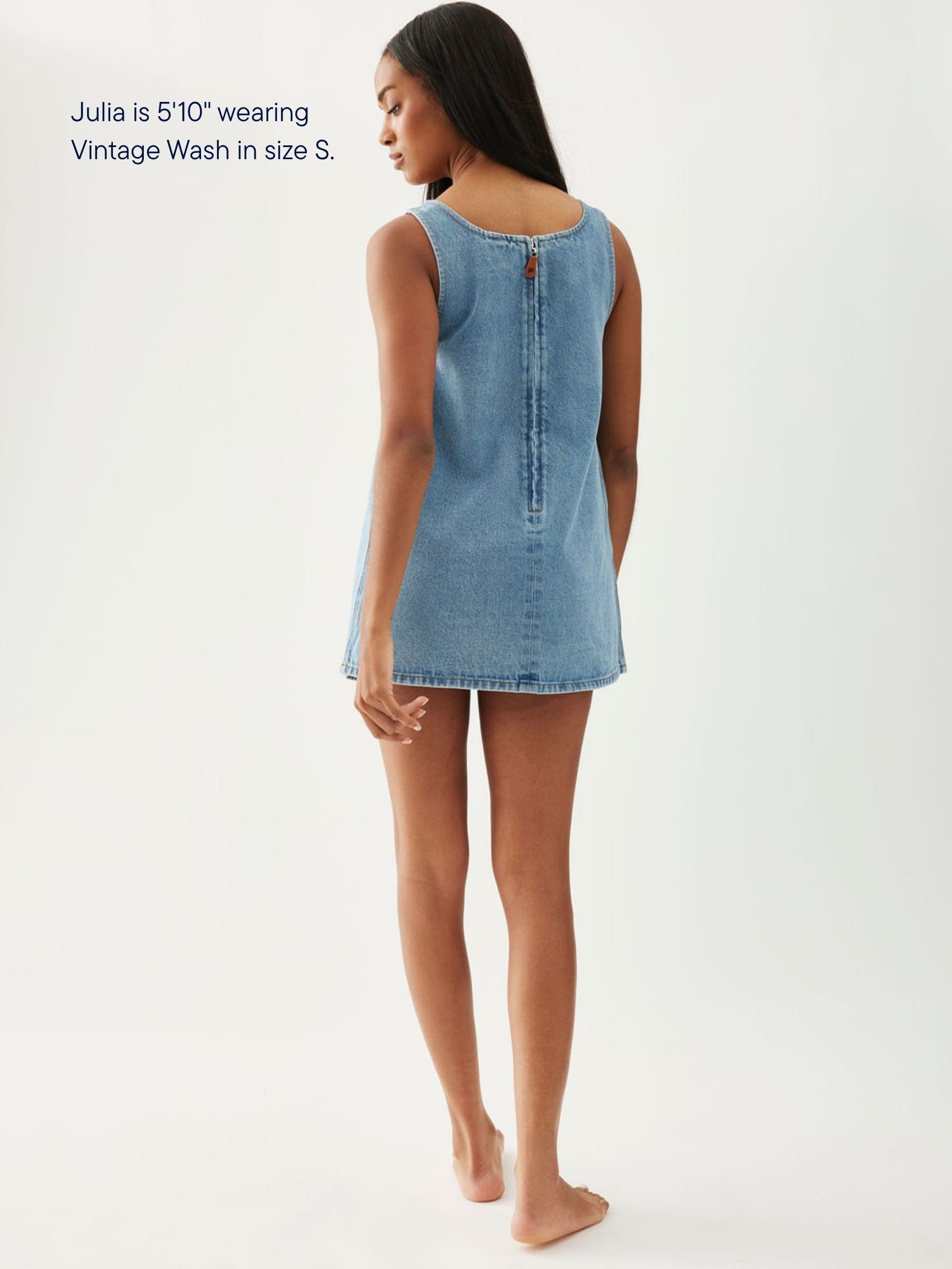 girl wearing denim mini dress -vintage wash