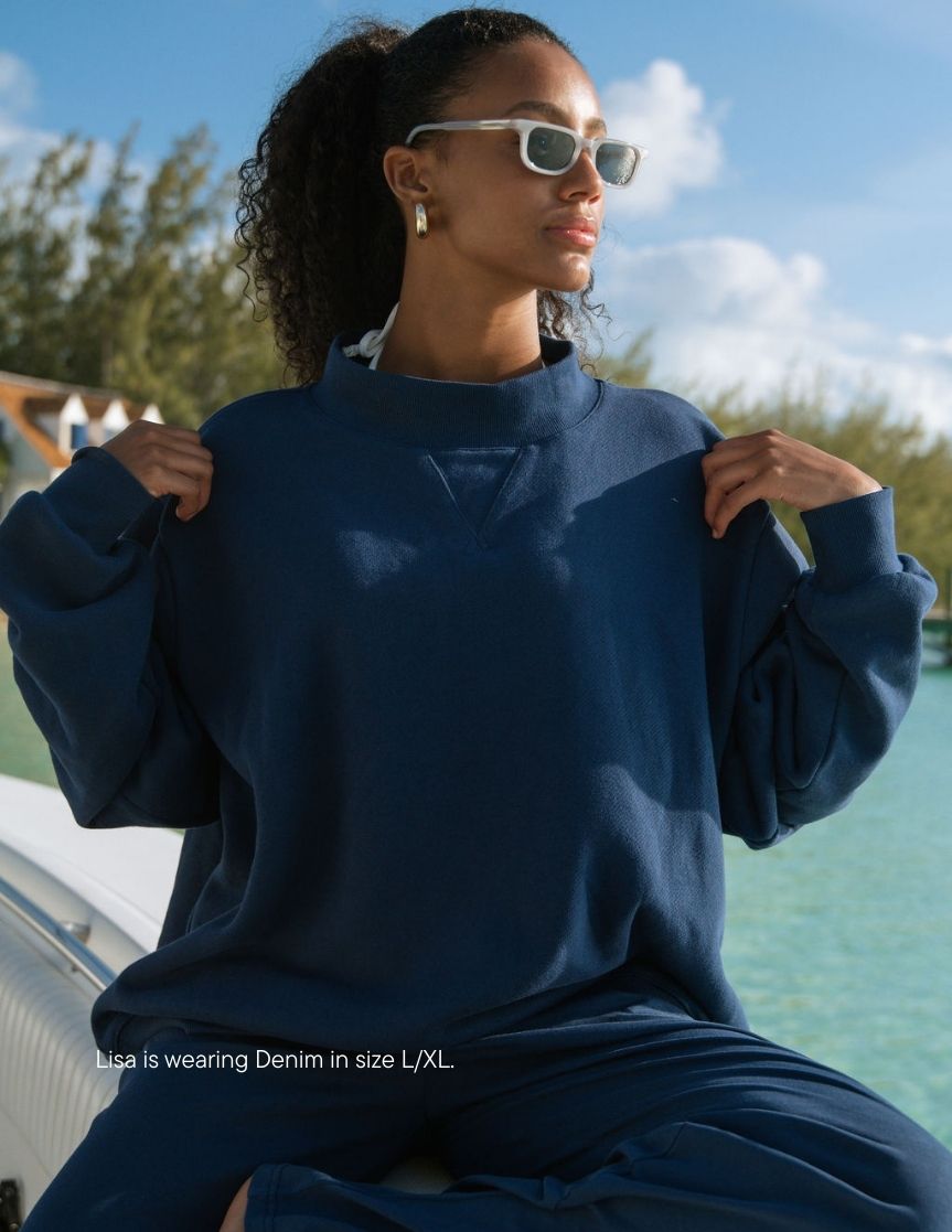 girl wearing heritage classic mockneck -denim