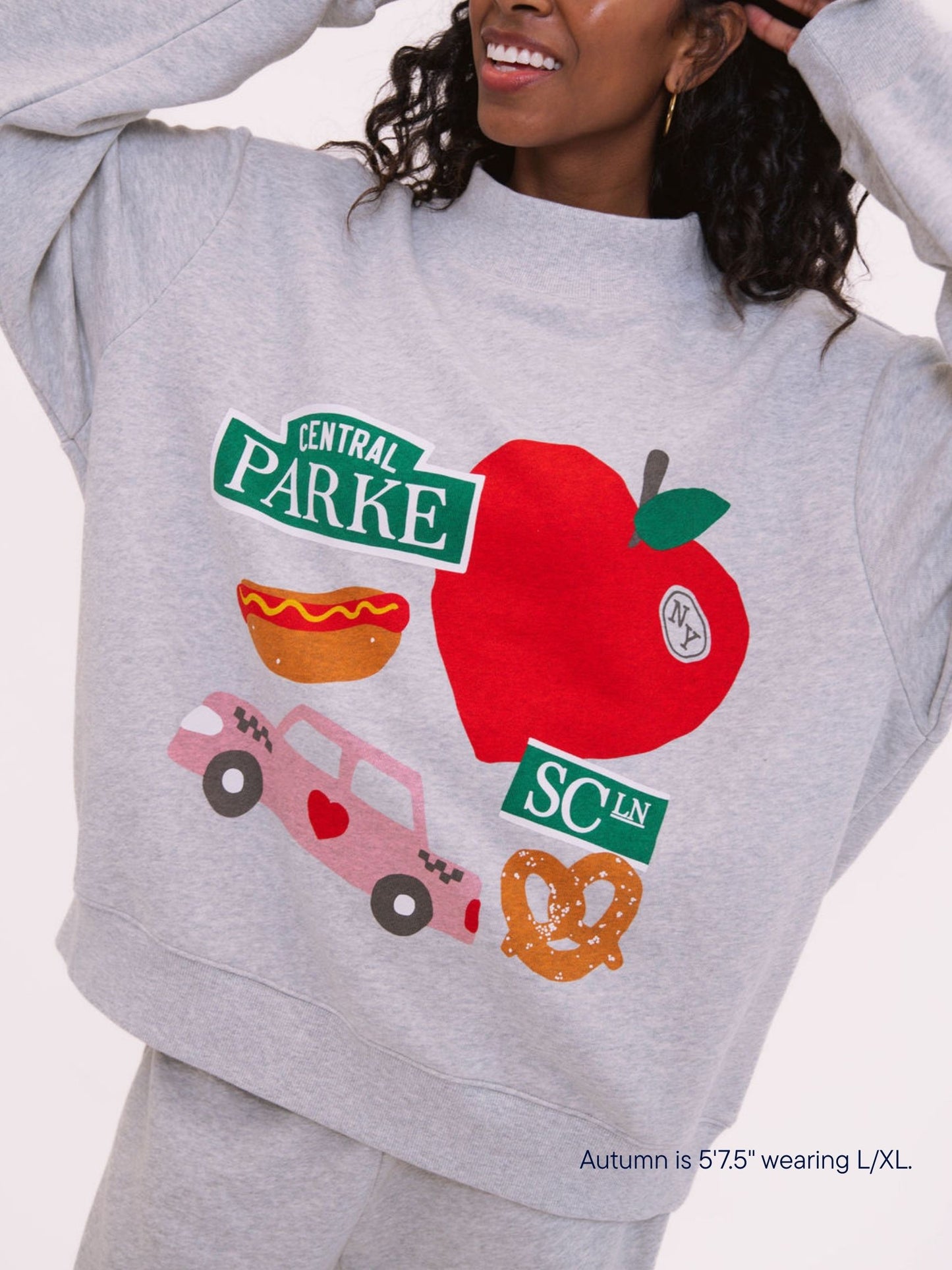 girl wearing parke x scl graphic mocneck -heather grey