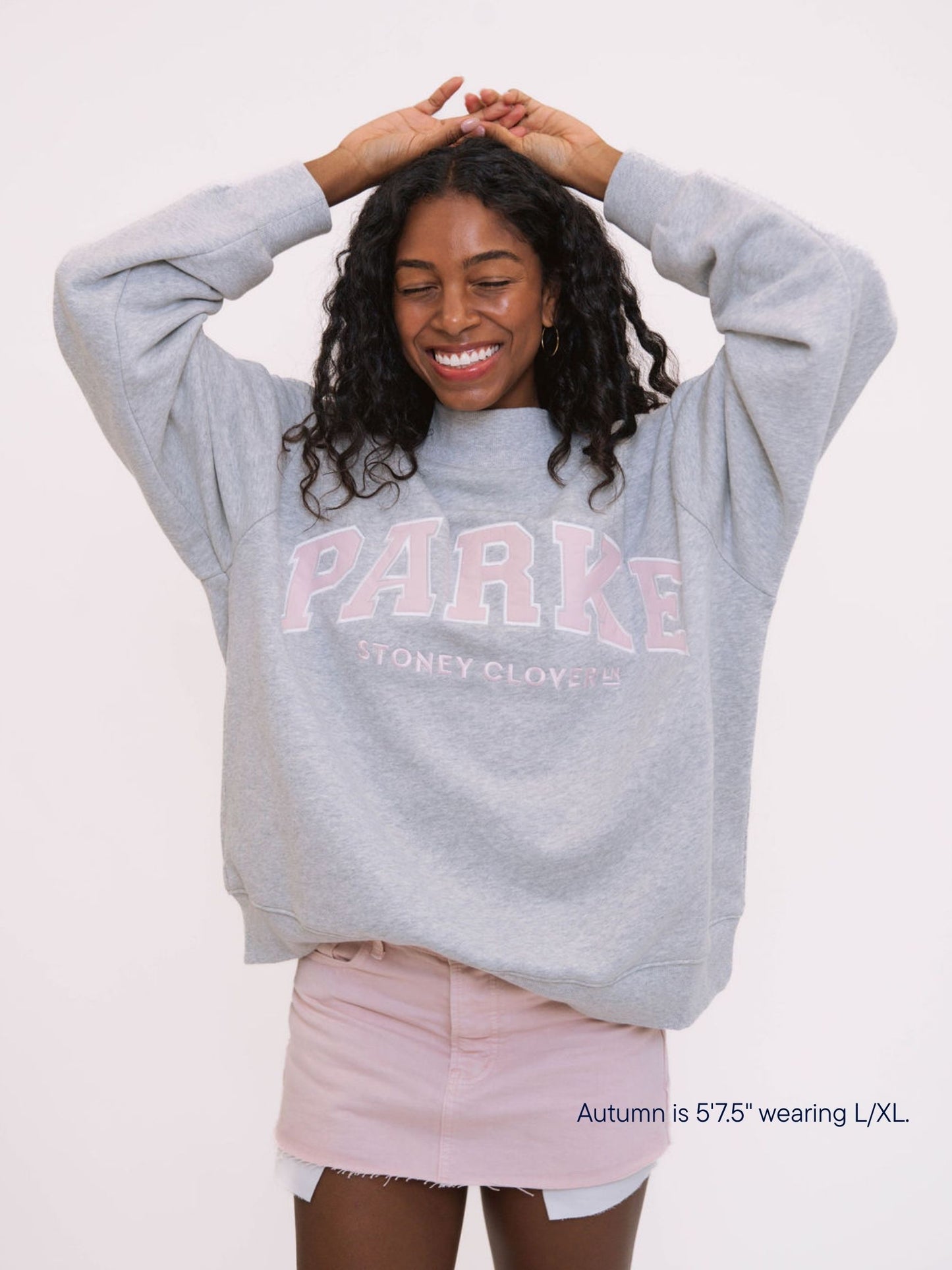 girl wearing parke x scl varsity mockneck -classic grey + pink