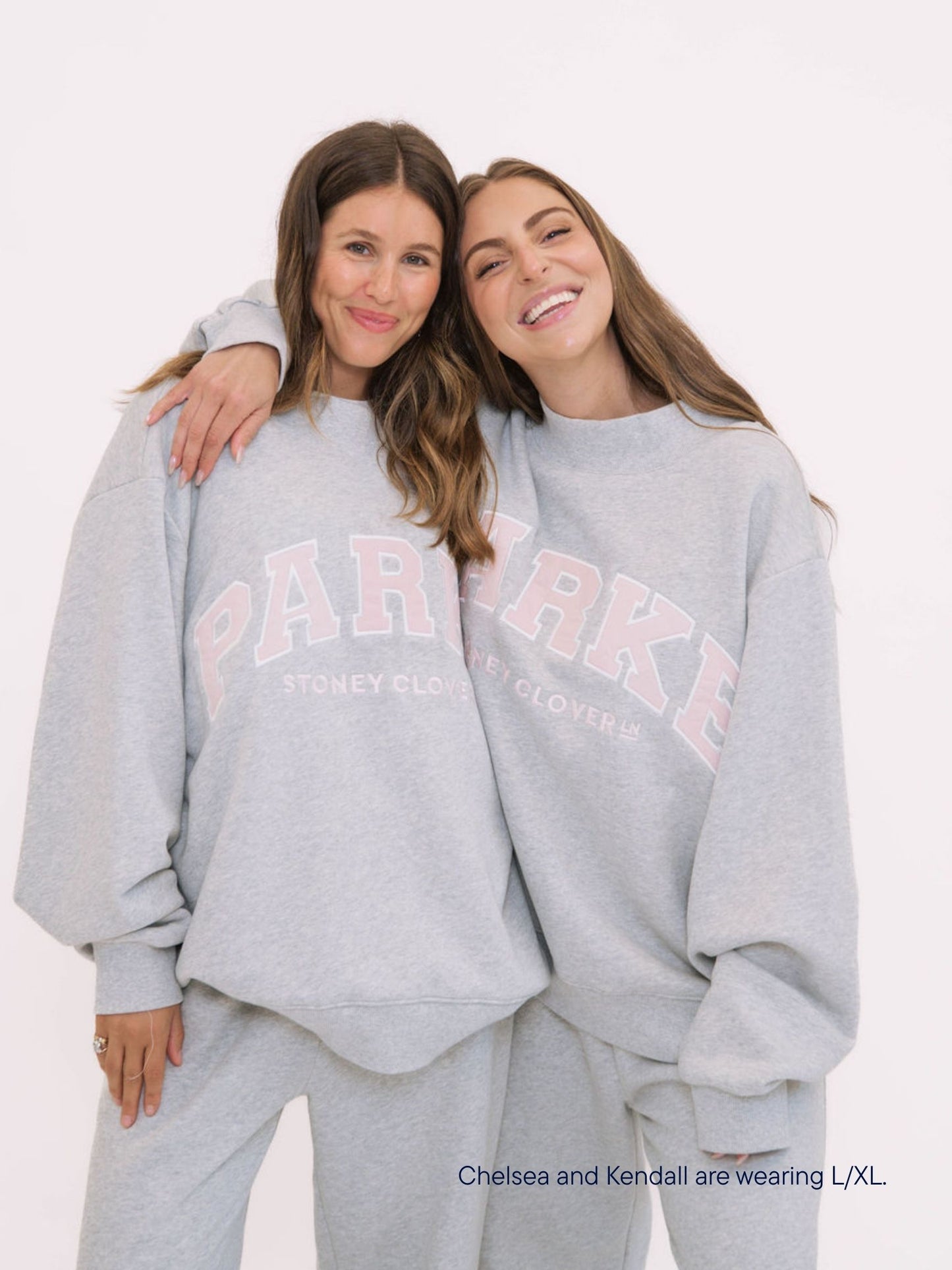 girl wearing parke x scl varsity mockneck -classic grey + pink