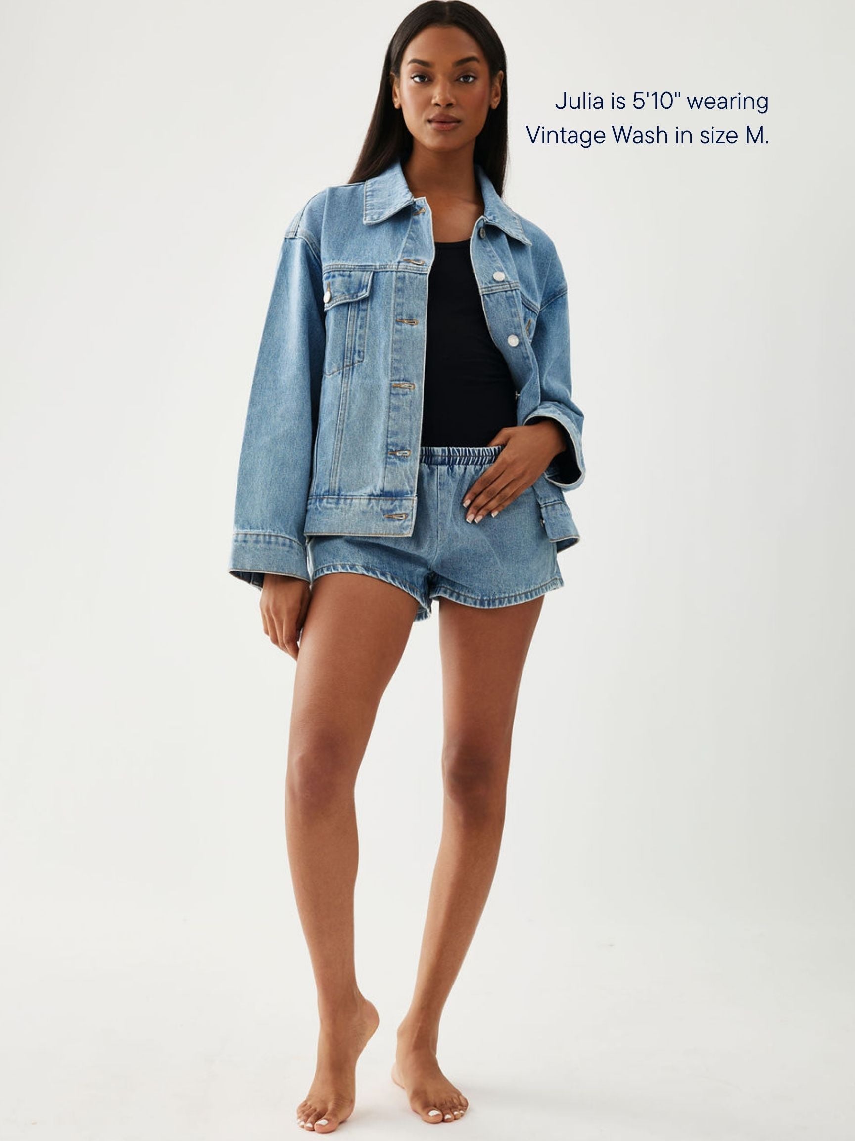 girl wearing elastic denim mini short -vintage wash