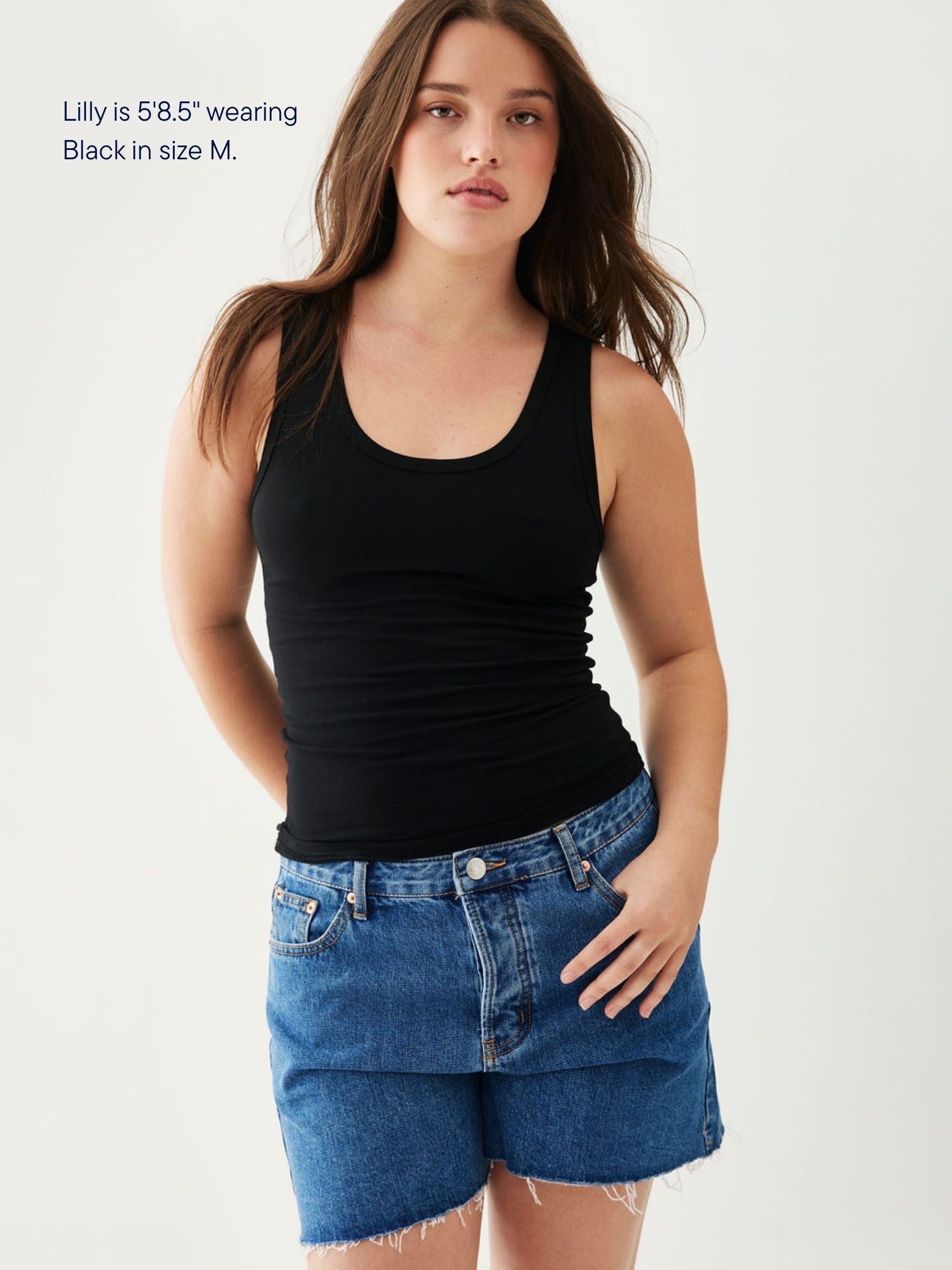 girl wearing core tee -black