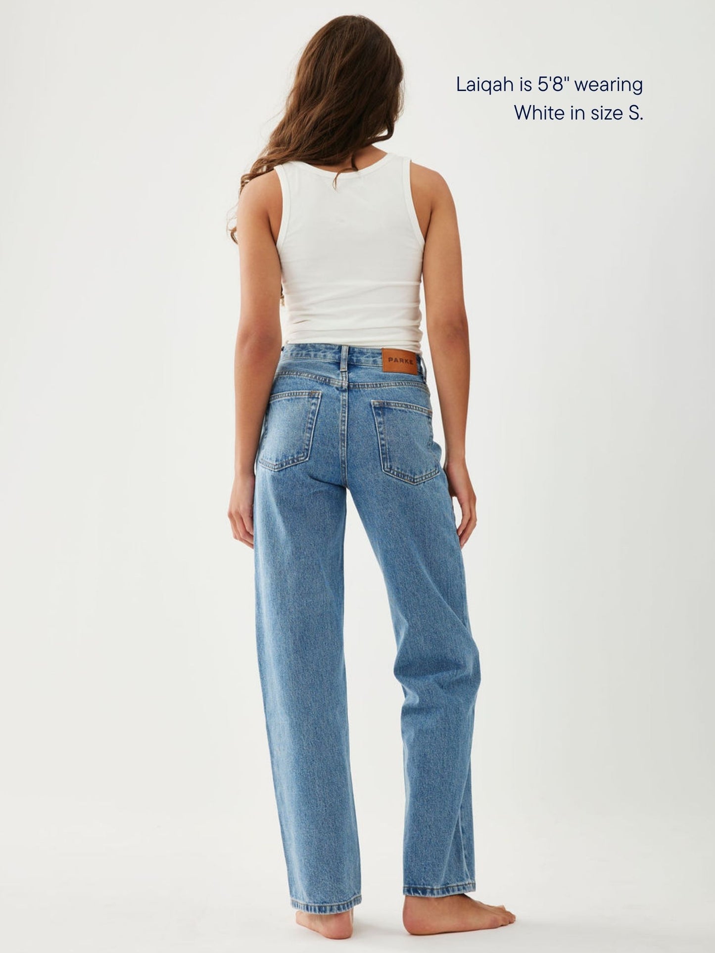 girl wearing core tee -white