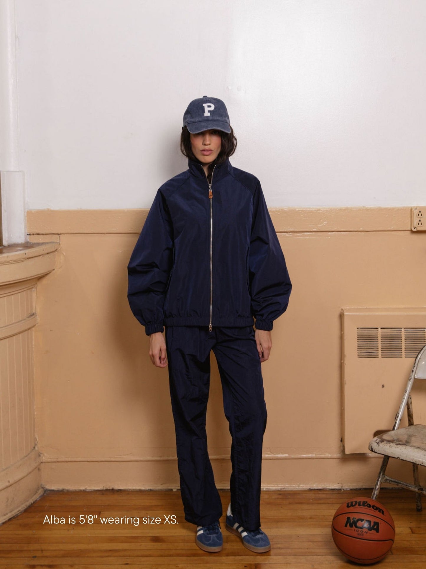 girl wearing nylon pants -navy