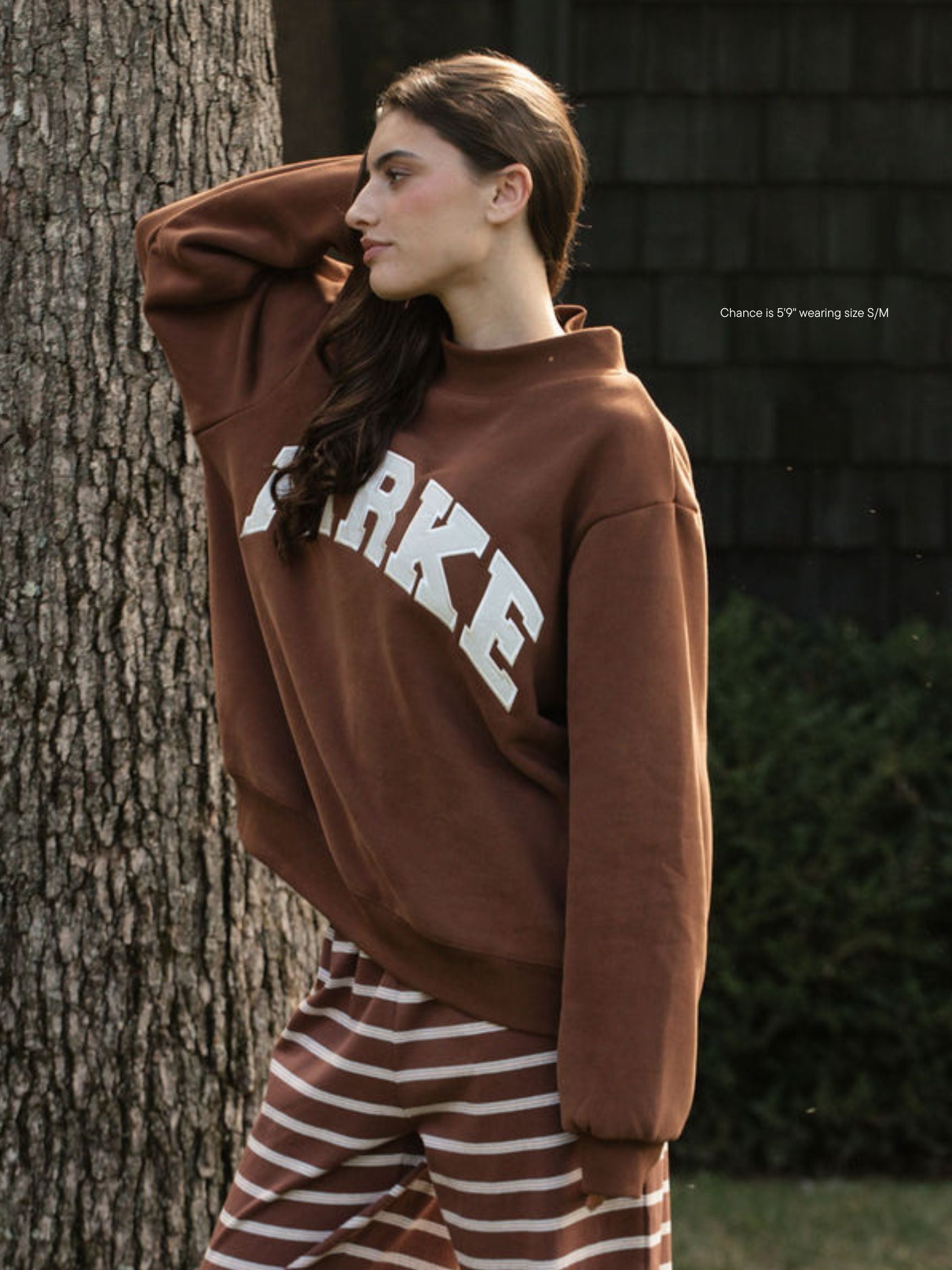 girl wearing hometown varsity mockneck -mocha + cloud