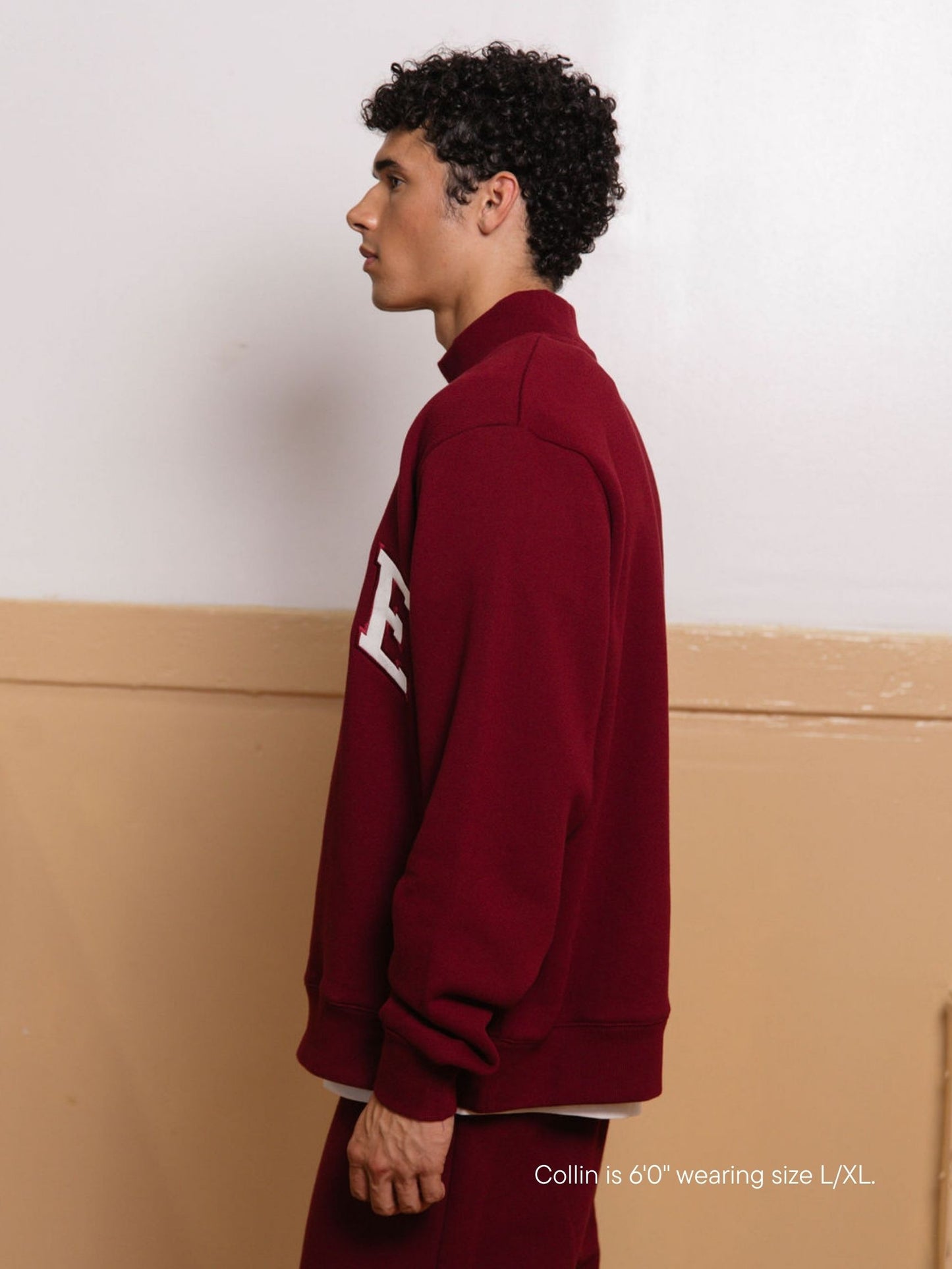boy wearing back to school varsity mockneck -maroon + white