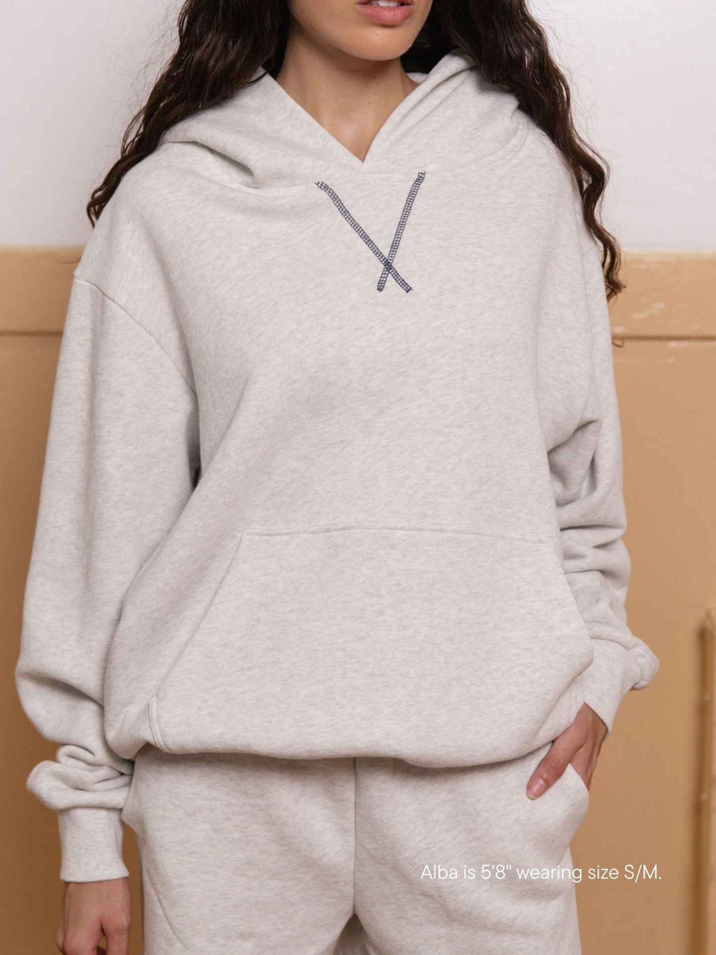 girl wearing classic hoodie -heather grey