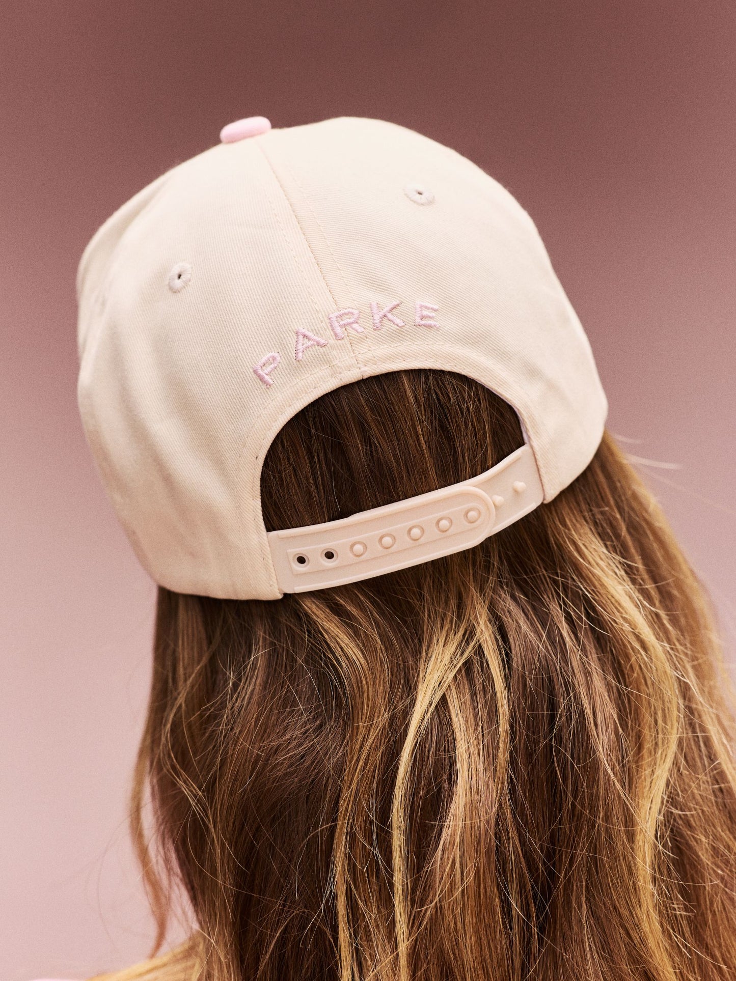 girl wearing Somebody Loves Me Hat -pink