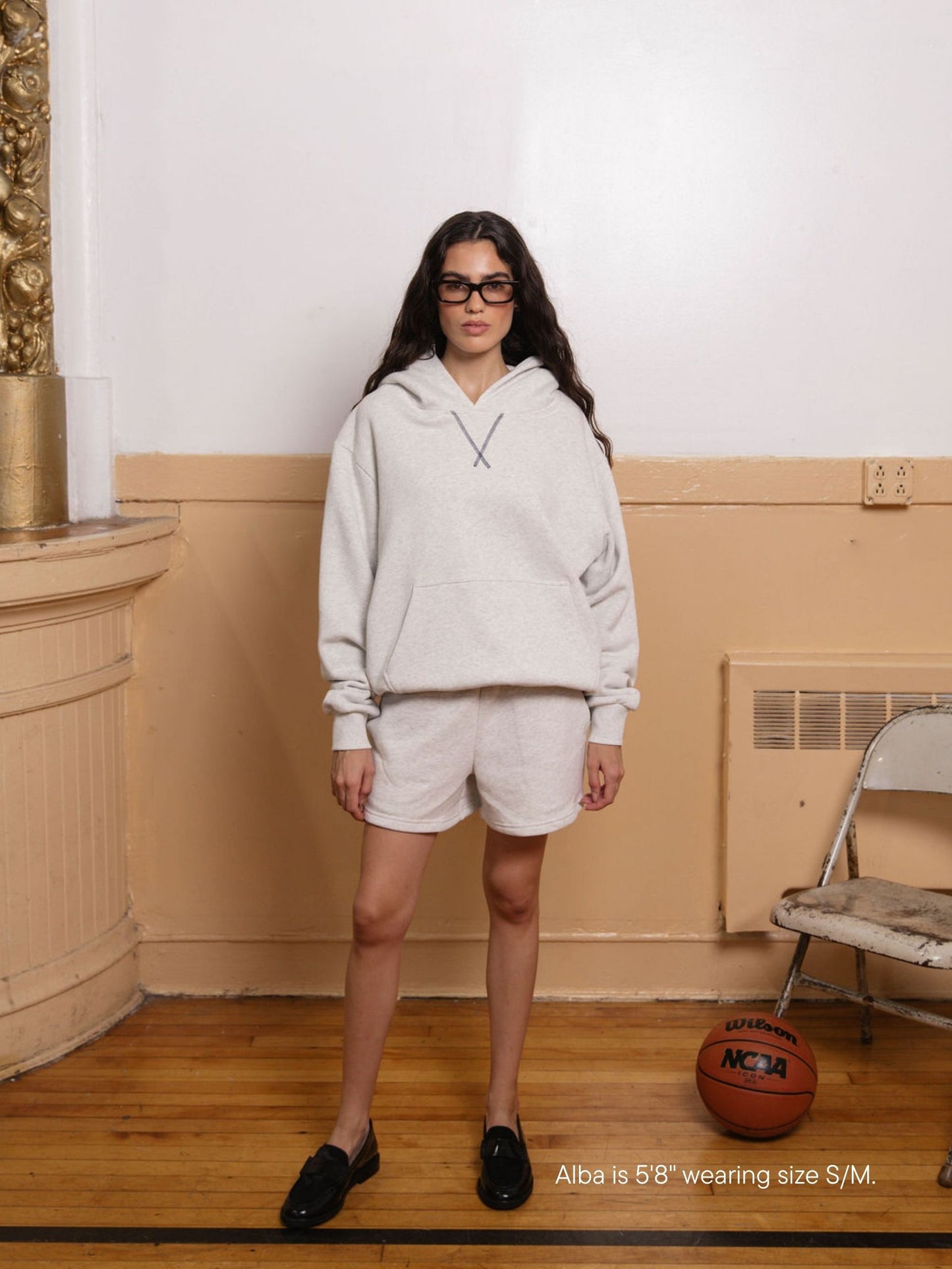 girl wearing classic hoodie -heather grey