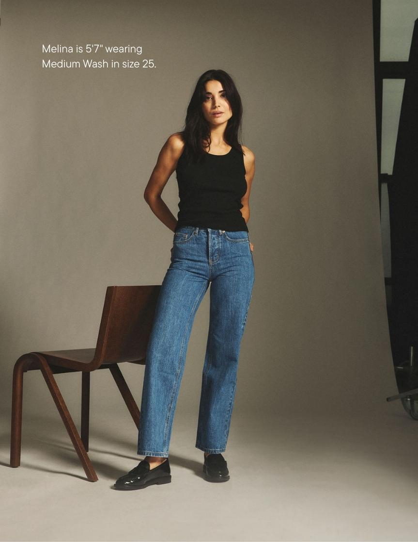 girl wearing classic straight jeans -medium wash