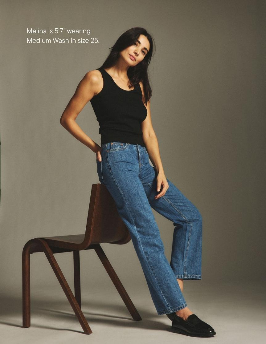 girl wearing classic straight jeans -medium wash