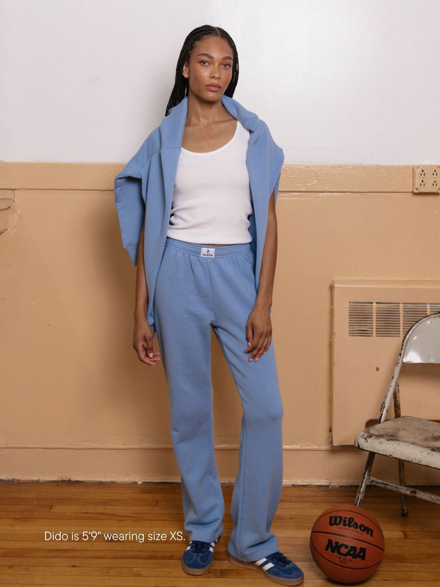 girl wearing boxer sweatpants -sky