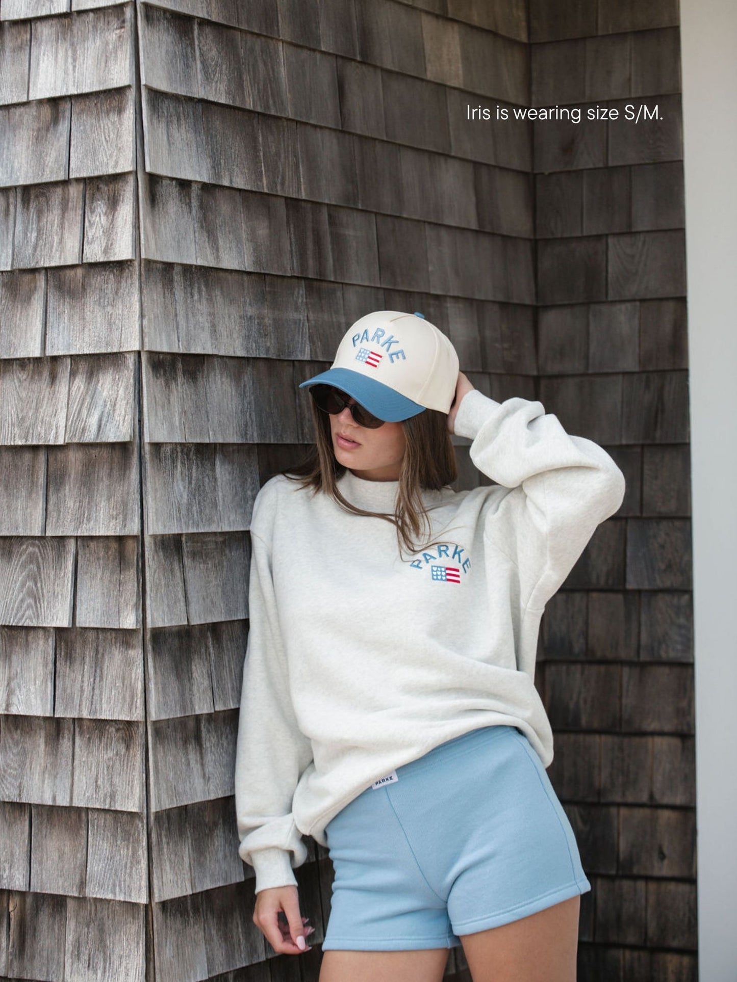 girl wearing flag mockneck -heather grey