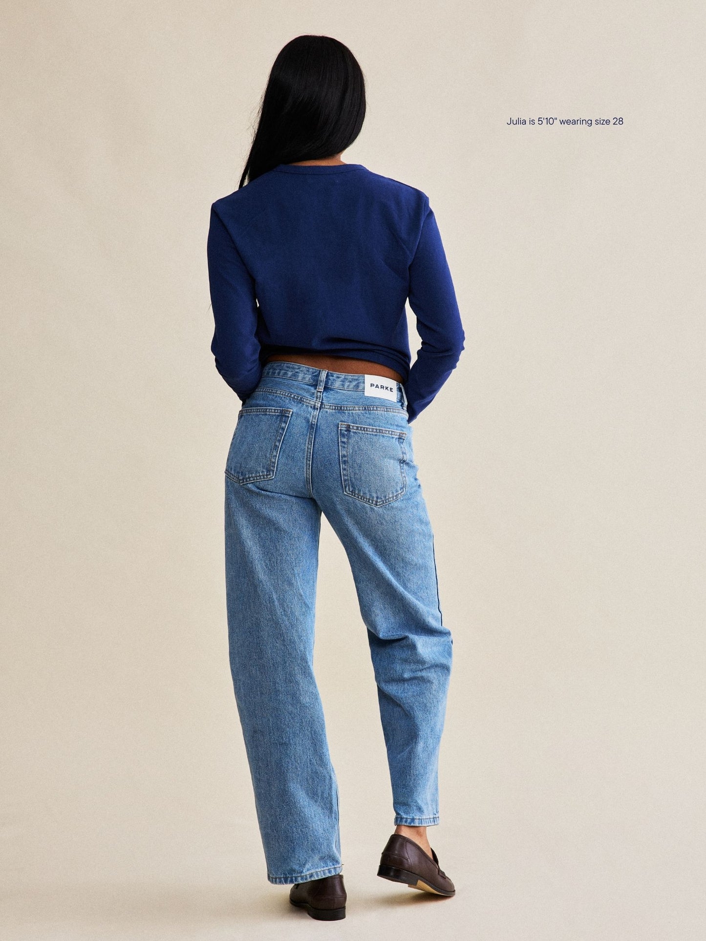 girl wearing classic straight jean -vintage wash
