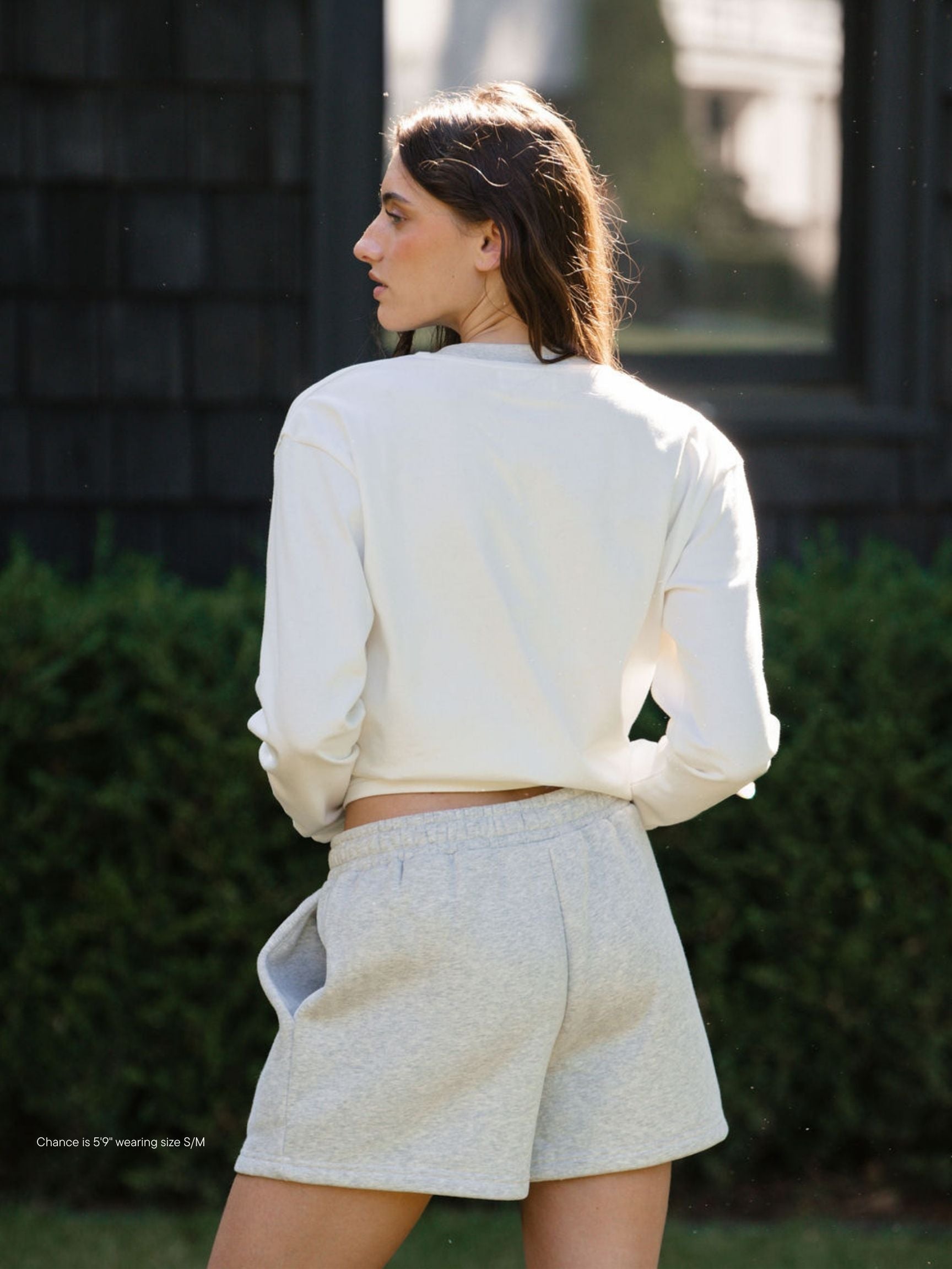 girl wearing Fleece Lounge Sweatshorts -classic grey