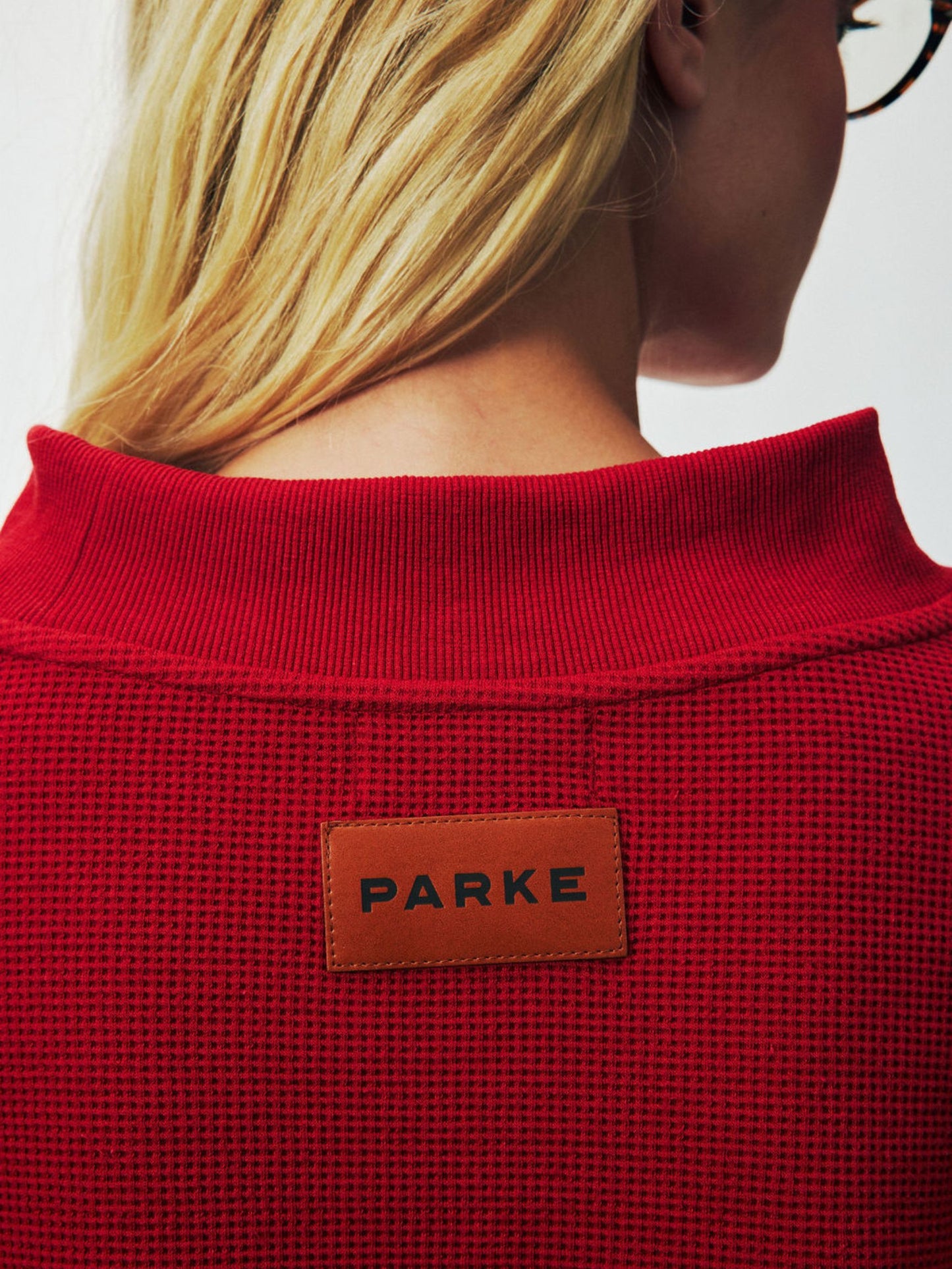 girl wearing Holiday Waffle Pullover -cola