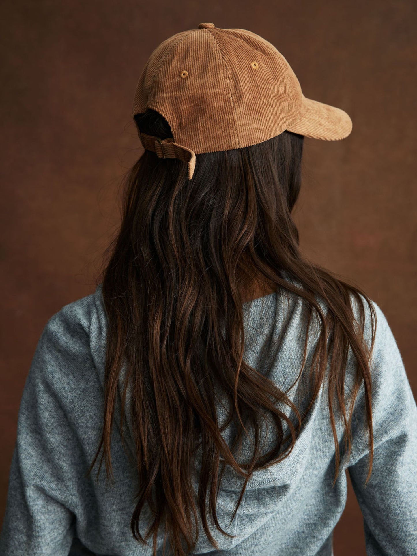 girl wearing Corduroy Baseball Hat -caramel corduroy