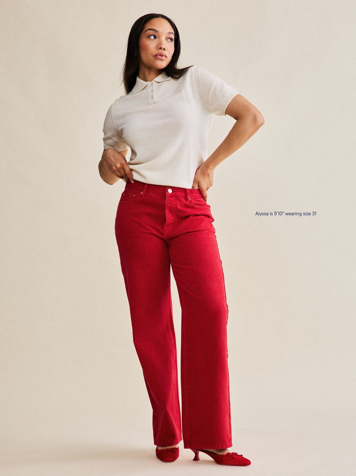 girl wearing classic straight jeans -washed red