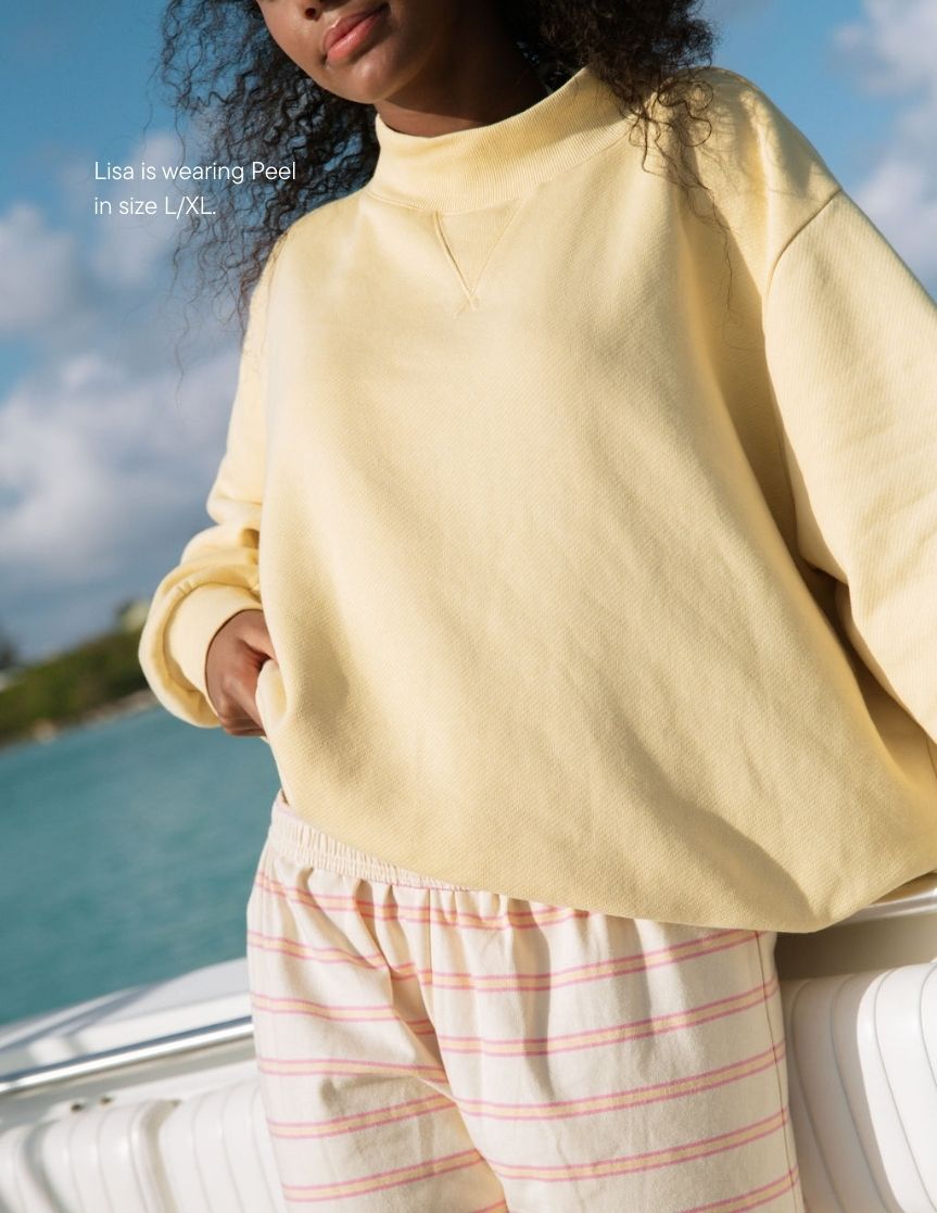 girl wearing heritage classic mockneck -peel