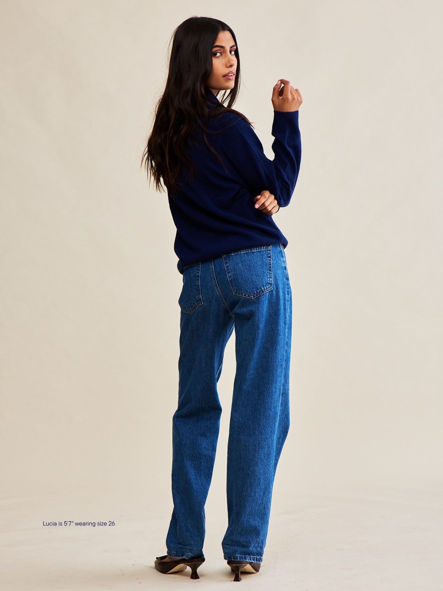 girl wearing classic straight jeans -medium wash