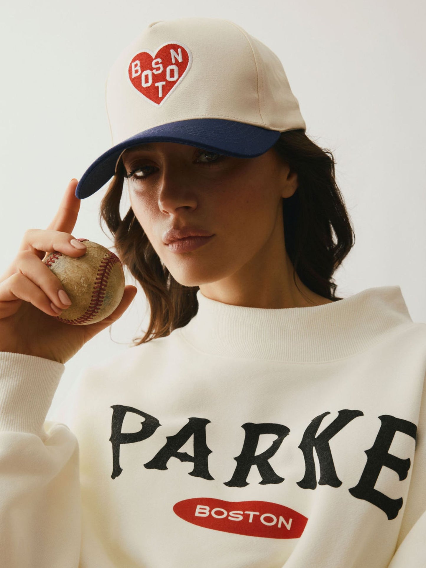 girl wearing Cities Hat Boston -cream