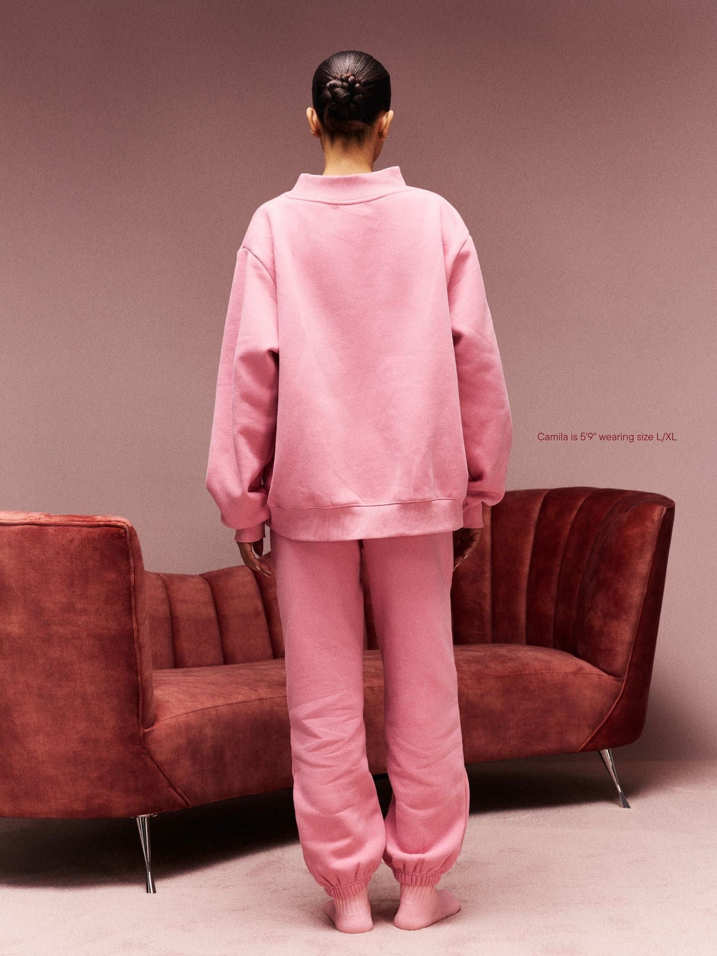 girl wearing Jean Heart Varsity Mockneck -blush