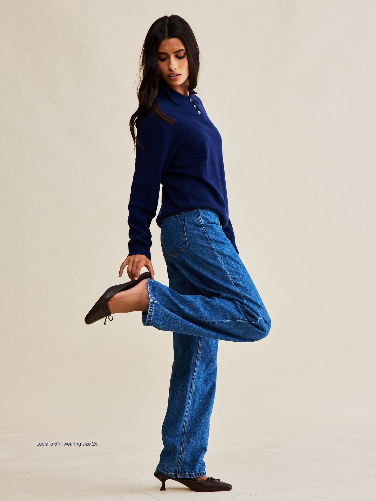 girl wearing classic straight jeans -medium wash