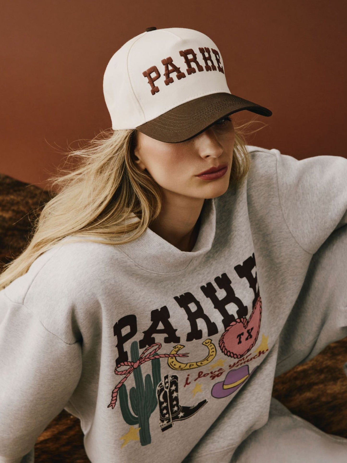 girl wearing Cities Hat Texas -cowboy