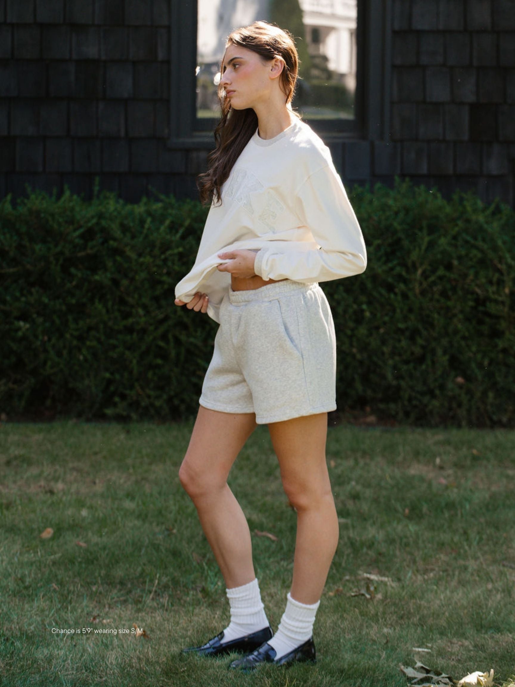 girl wearing Fleece Lounge Sweatshorts -classic grey