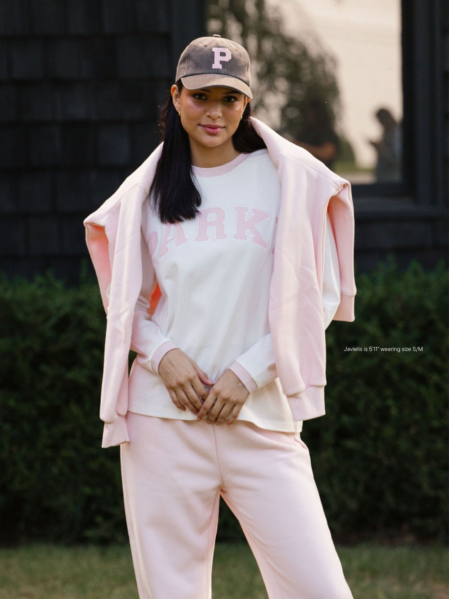girl wearing varsity long sleeve-rose