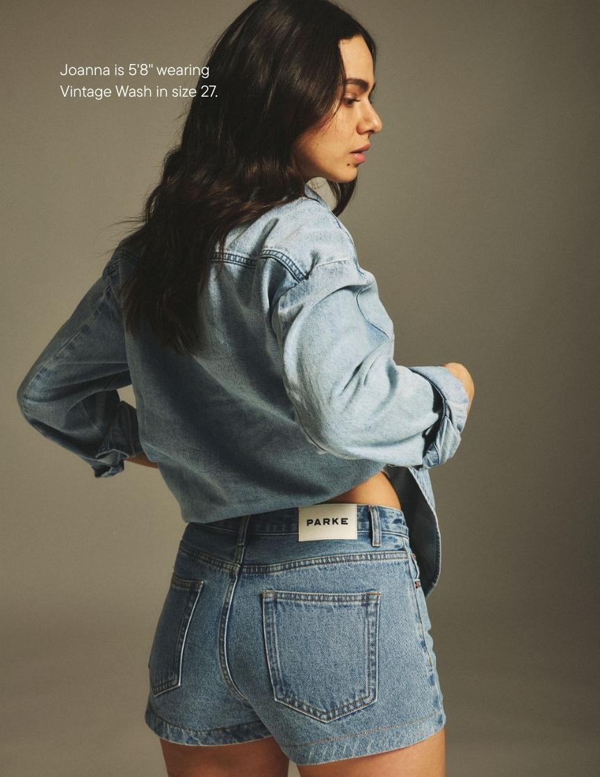 girl wearing denim mini shorts -vintage wash