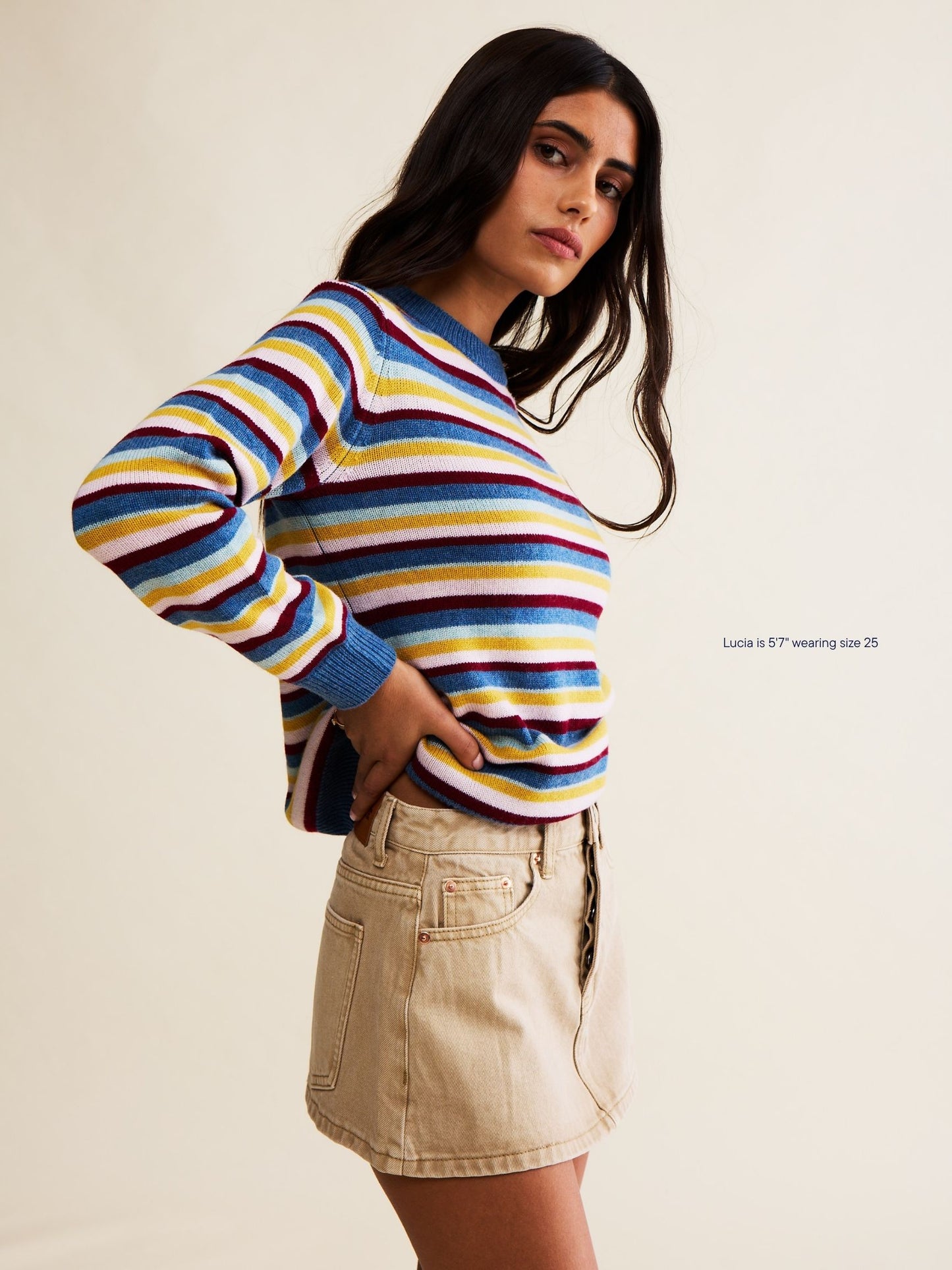 girl wearing denim mini skirt -camel