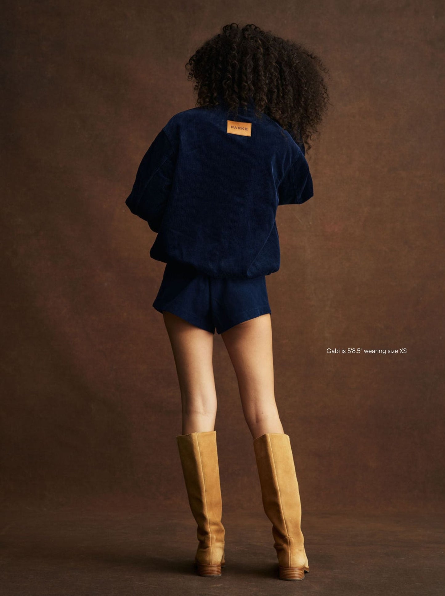 girl wearing Corduroy Mini Shorts -navy corduroy