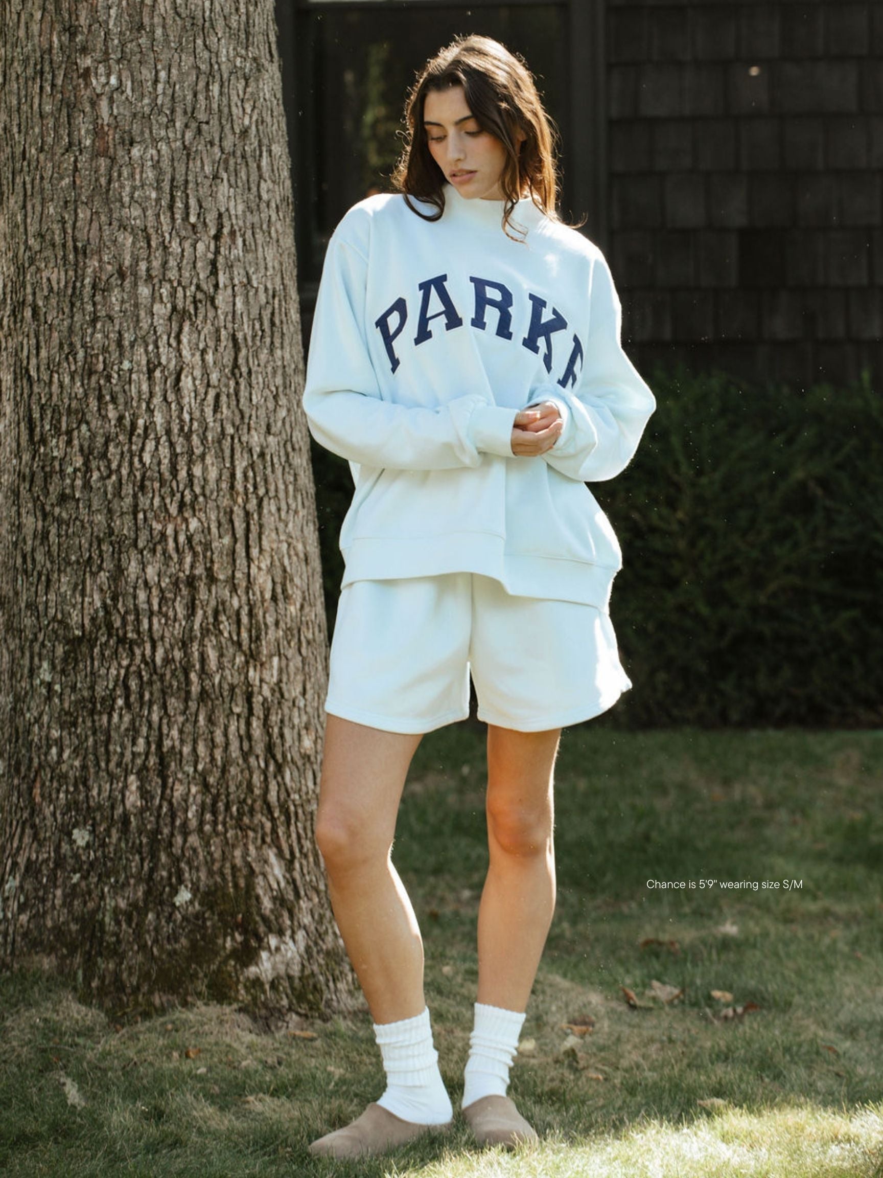girl wearing Fleece Lounge Sweatshorts -cloud